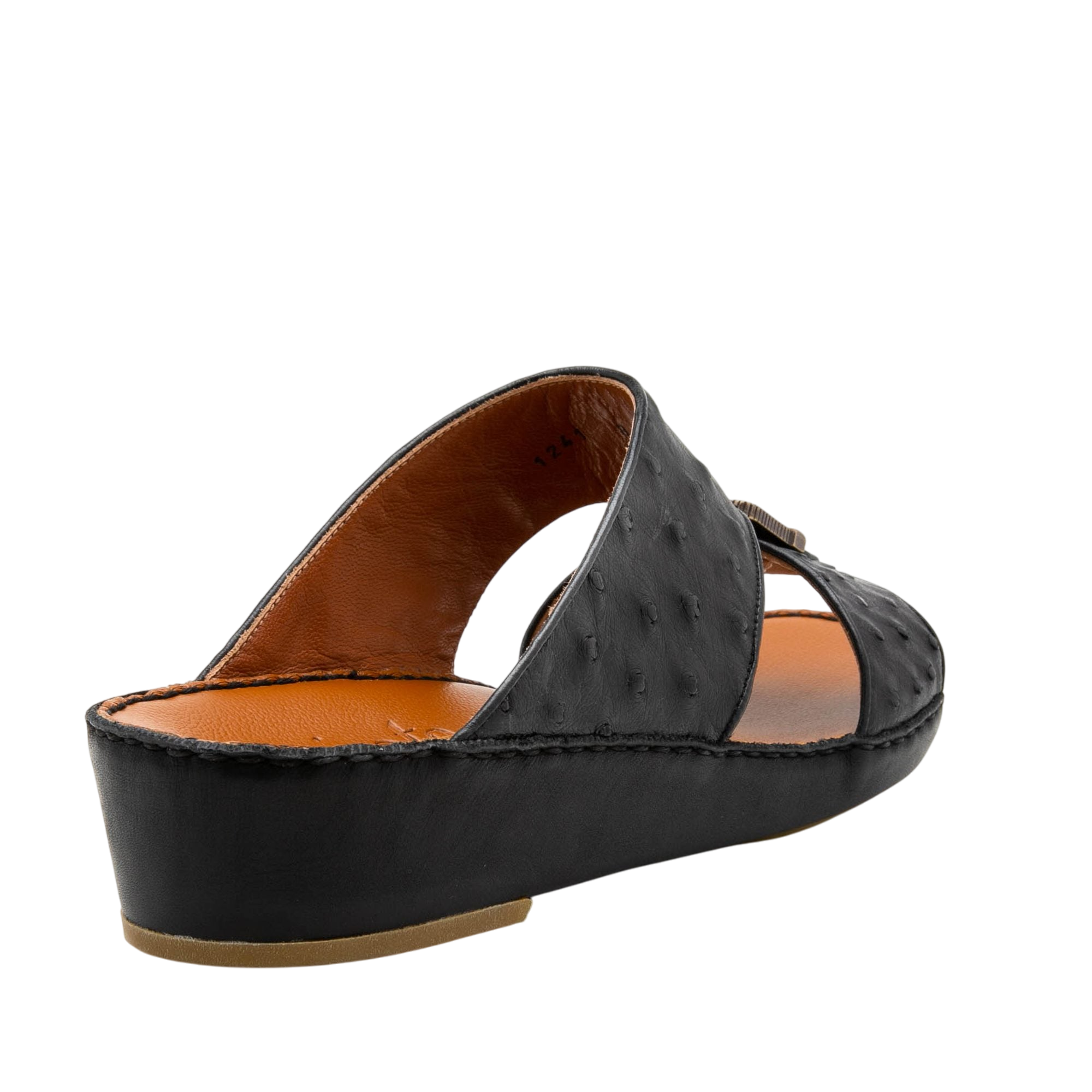 Black luxury leather sandals with textured upper and cushioned tan insole from private collection