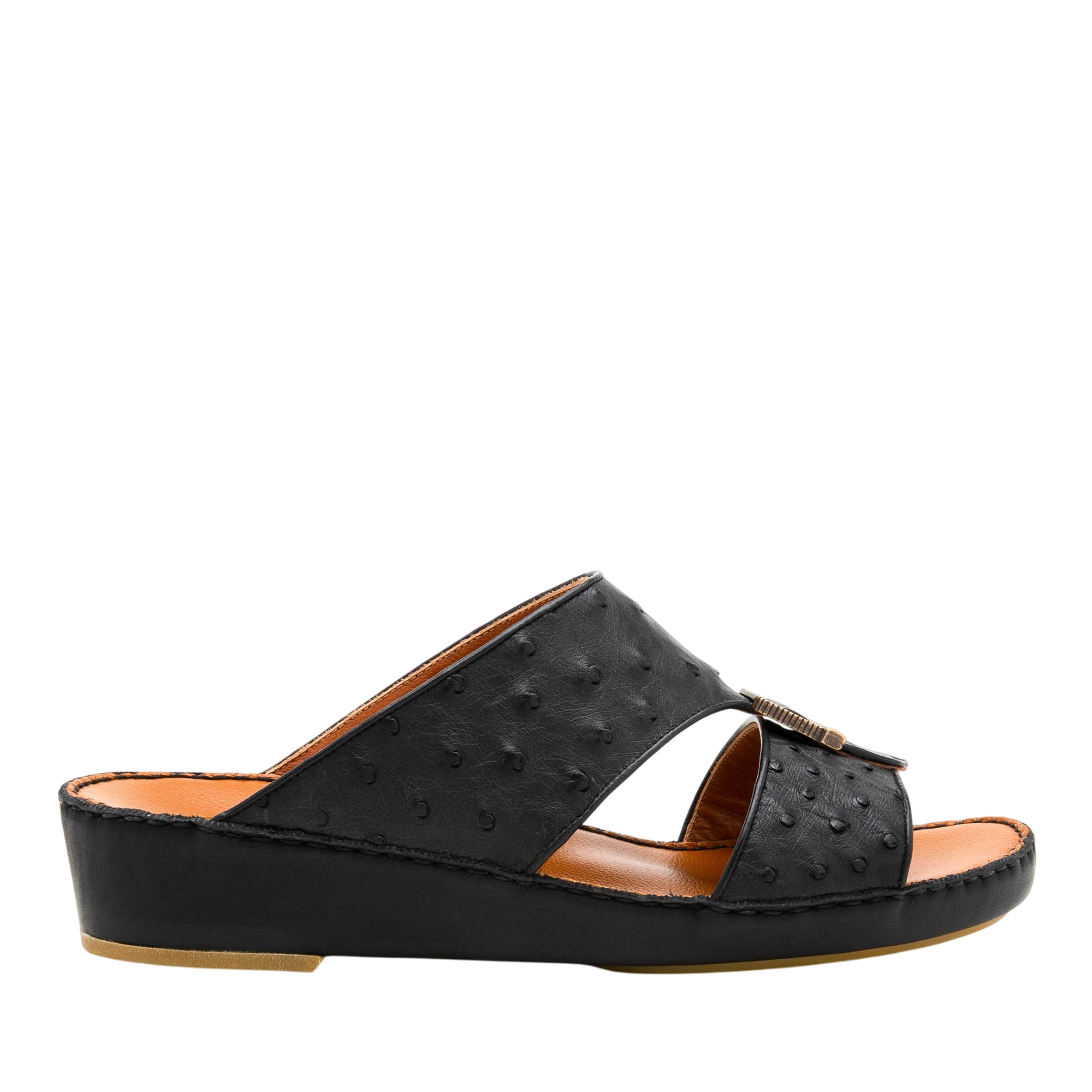 Black luxury leather sandals with textured upper and low wedge heel for comfortable wear