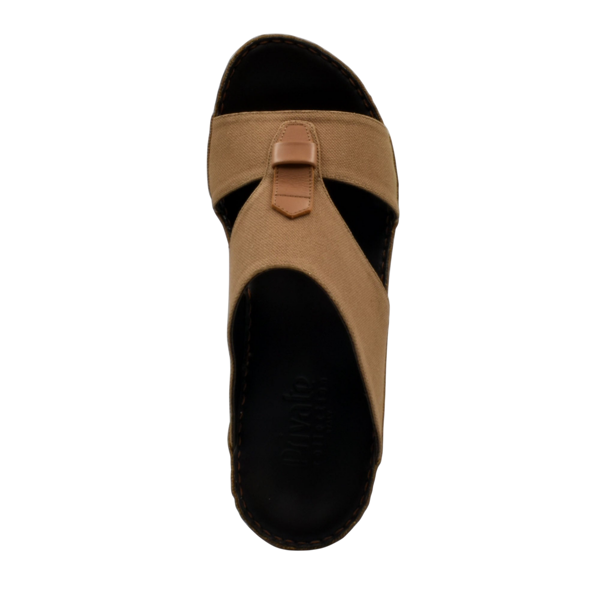 Top view of tan casual wedge sandals with black footbed and cross straps for comfortable wear