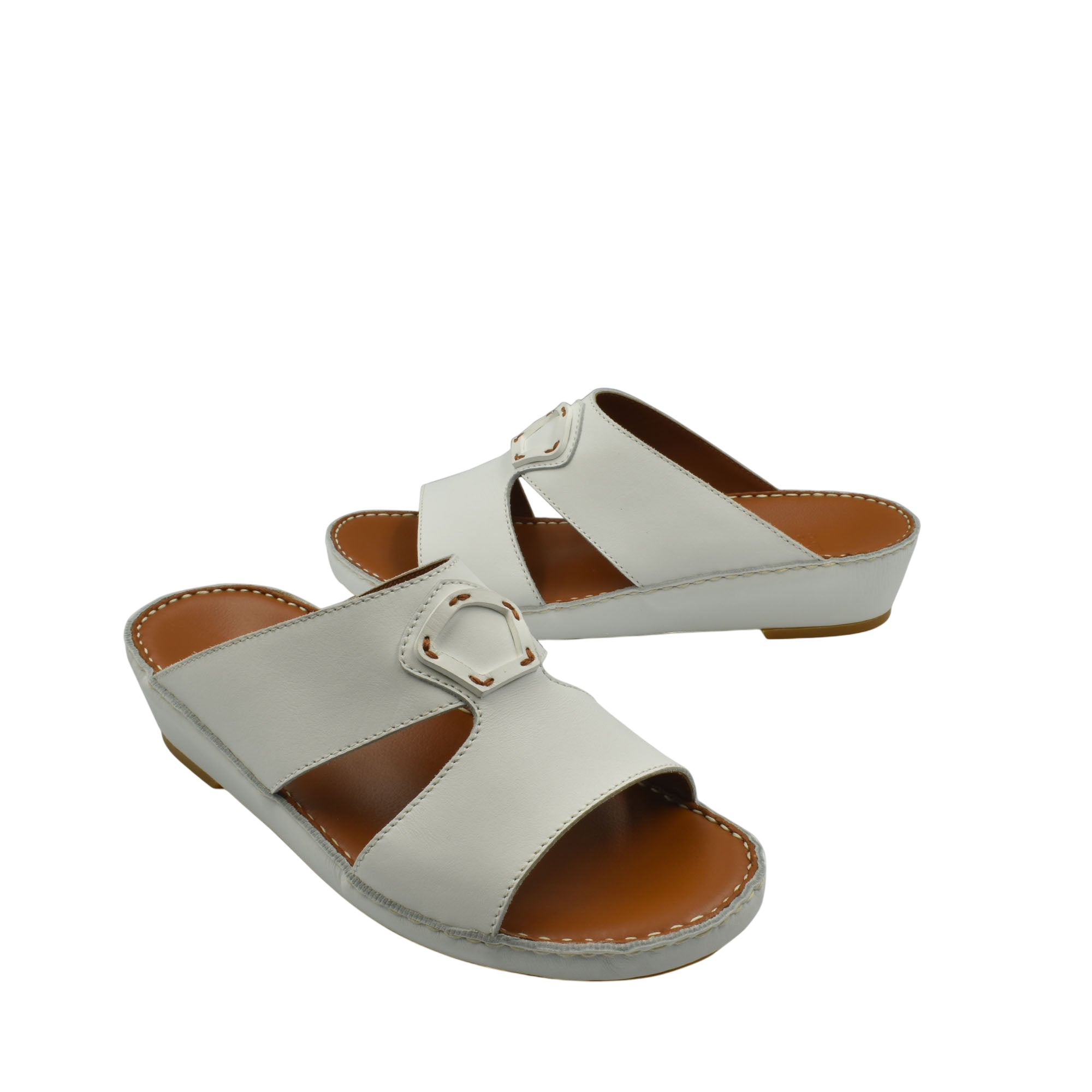 Comfortable leather slip-on sandals in white with a cushioned sole and adjustable buckle strap
