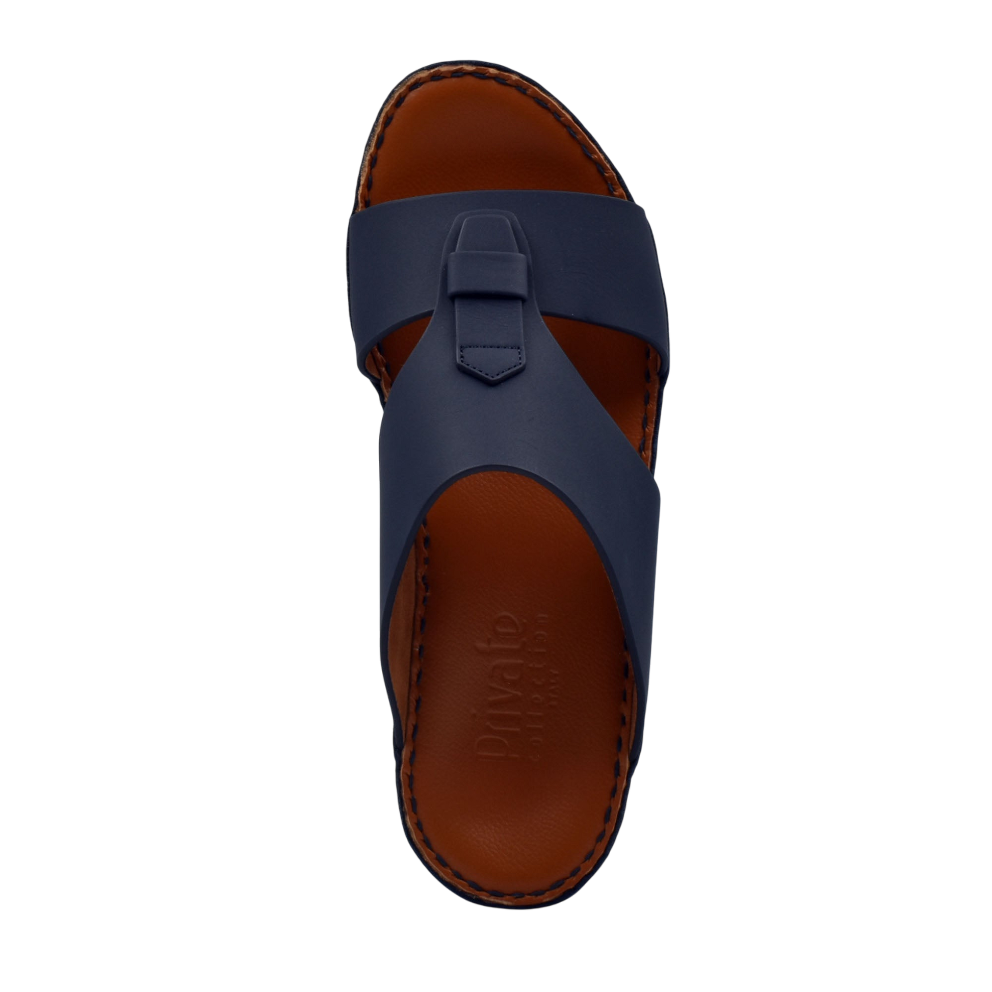 Top view of comfortable rubber slides in navy blue with brown cushioned sole from Private Collection