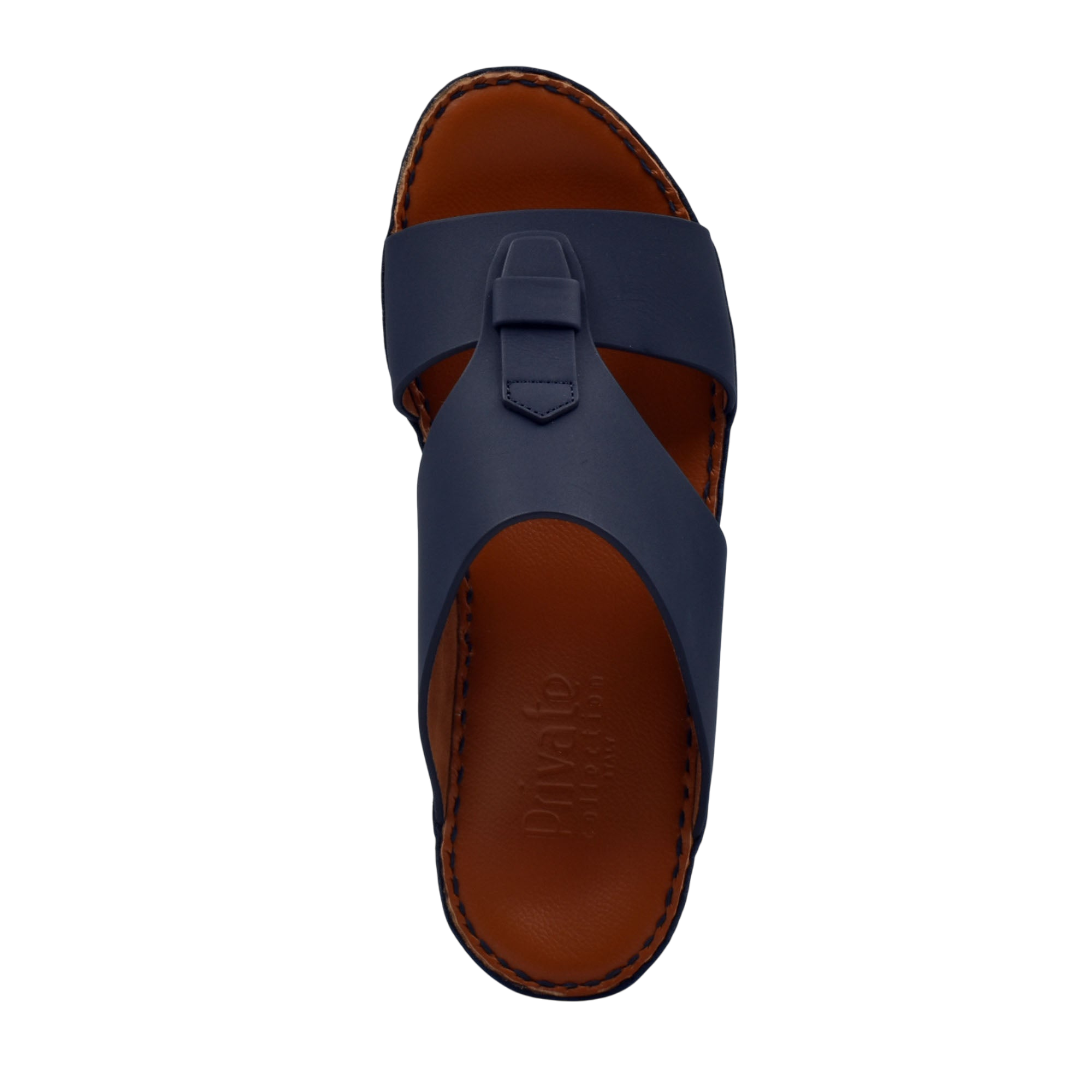 Top view of comfortable rubber slides in navy blue with brown cushioned sole from Private Collection
