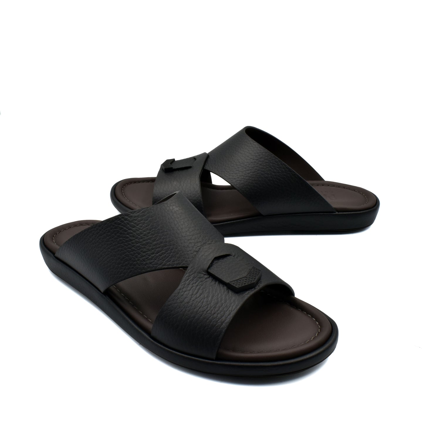 Comfortable stylish slides in black with textured leather straps and cushioned footbed from Private collection