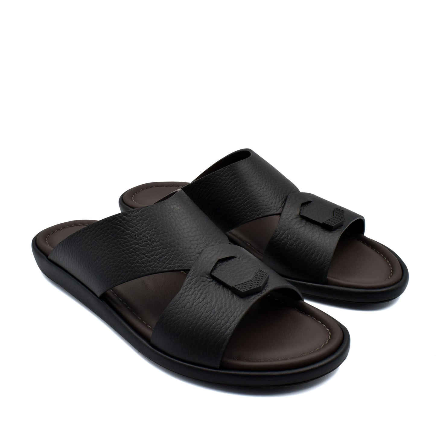 Black comfortable stylish slides with textured straps and cushioned footbed for everyday wear