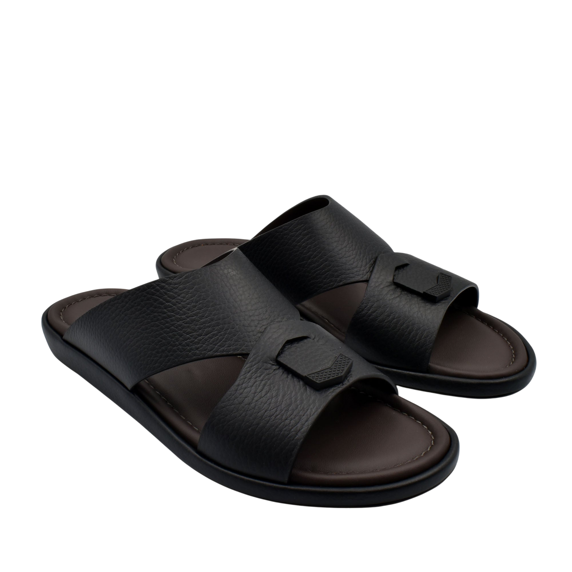 Black comfortable stylish slides with textured straps and cushioned footbed for everyday wear