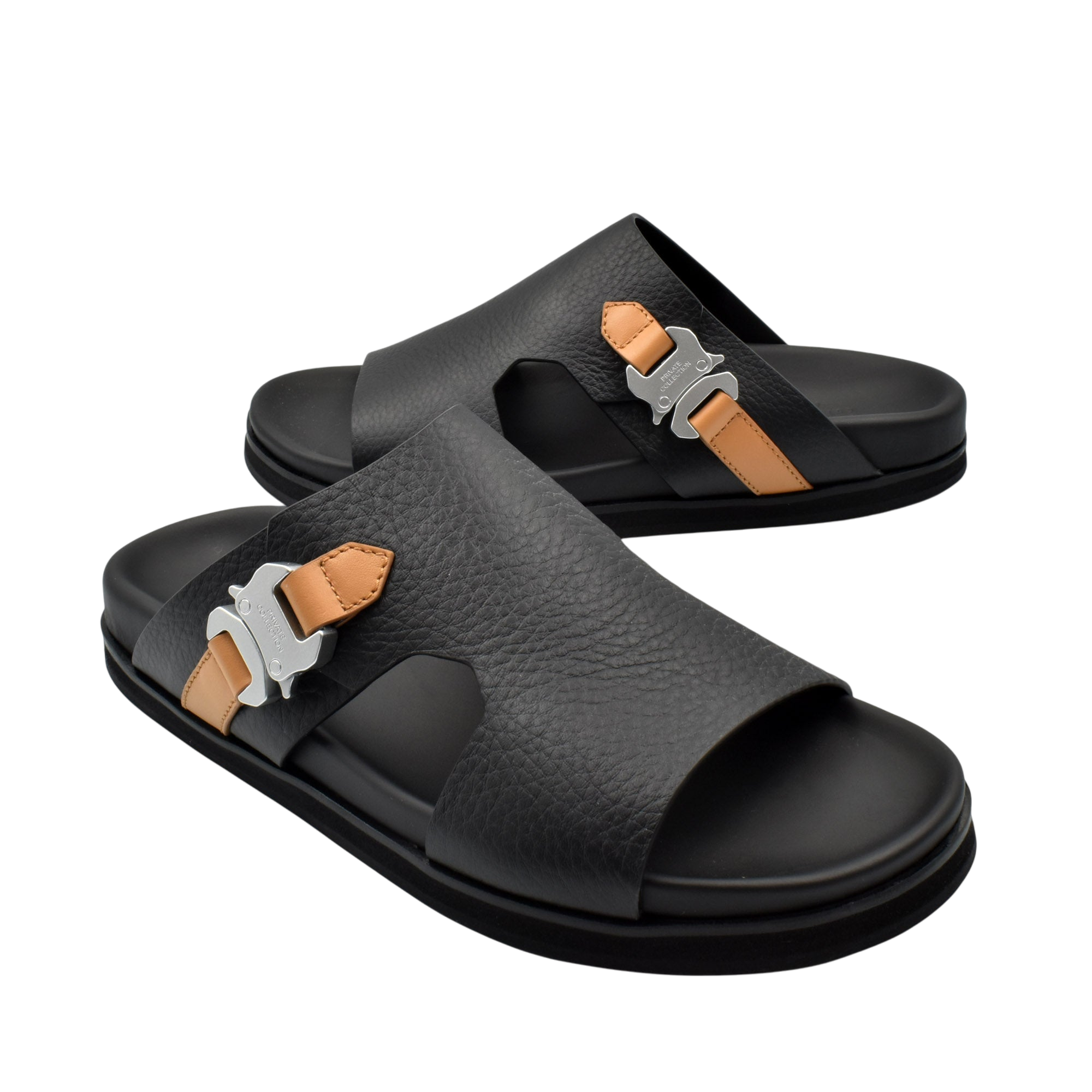 Private Collection black deercalf contrast sandal with tan strap and silver buckle on white background