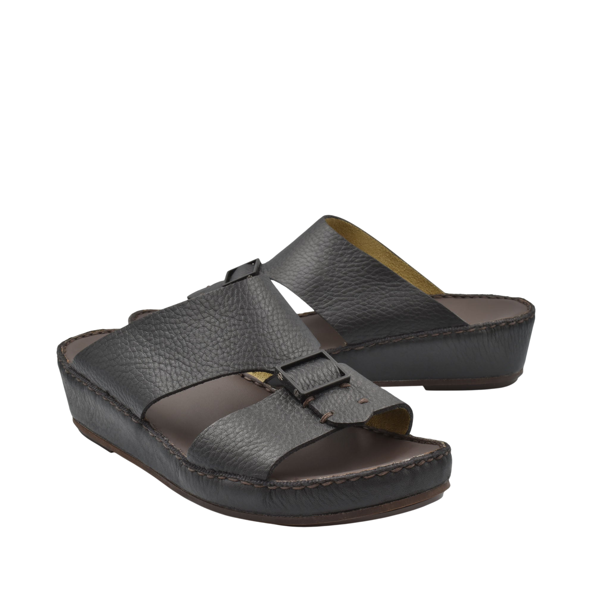 Black deercalf leather sandals with adjustable straps and cushioned wedge sole from private collection