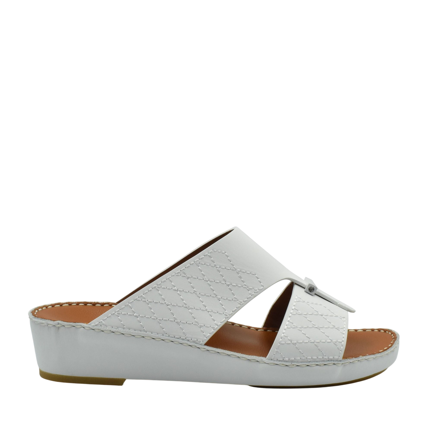 White designer leather sandals with quilted pattern and low wedge sole from Private collection