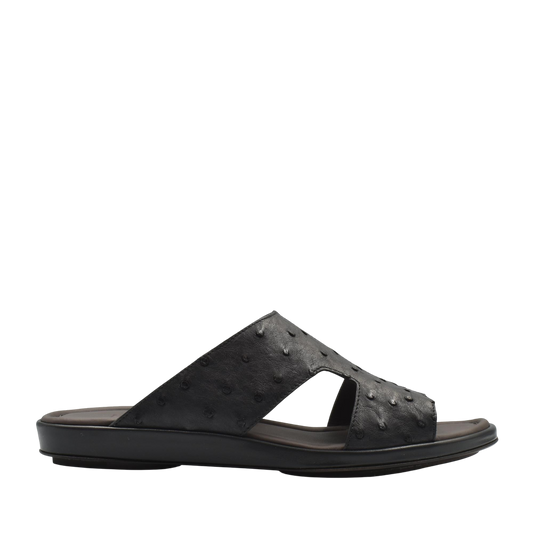 Black ostrich skin slide sandals with textured upper and comfortable sole from Private collection