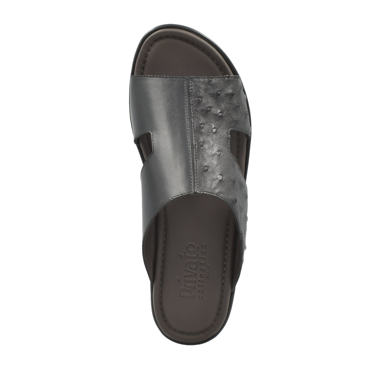 Black ostrich skin slide sandals from Private Collection with textured upper and open toe design