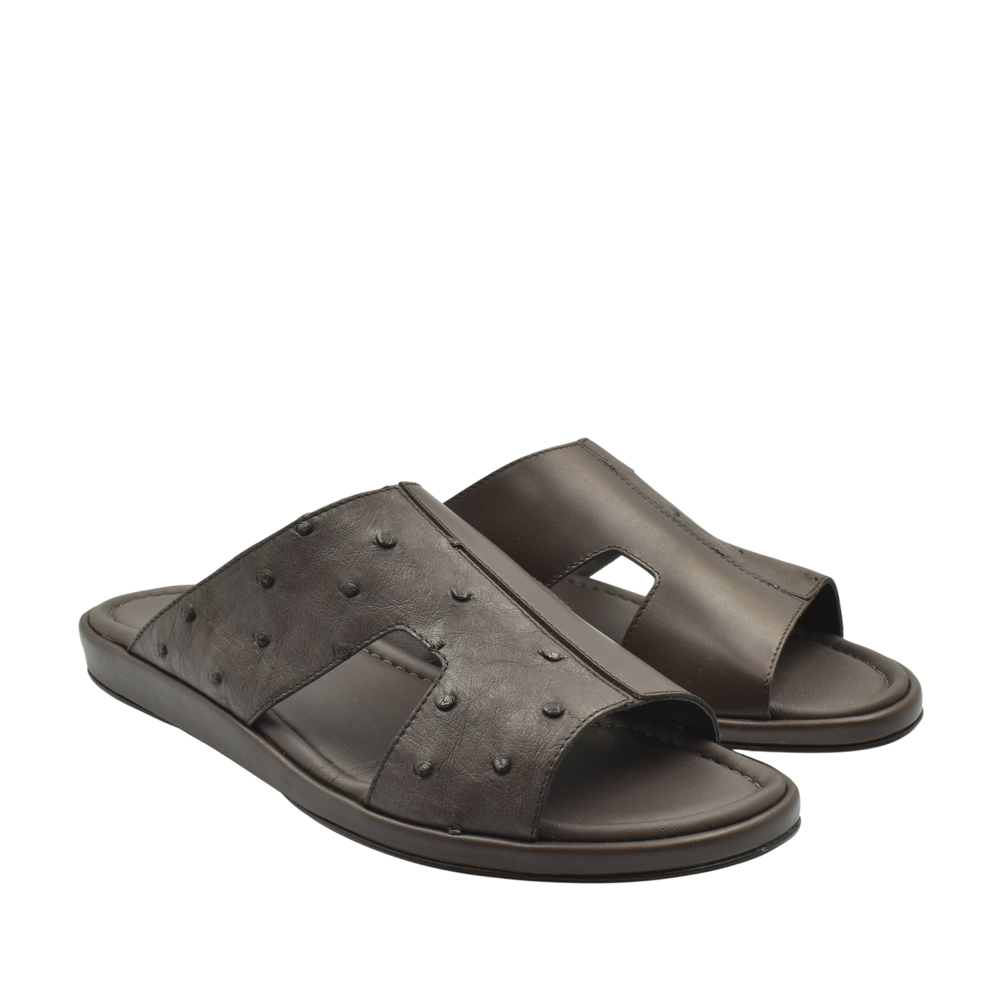 Brown ostrich skin slide sandals with textured leather and open toe design for comfortable wear