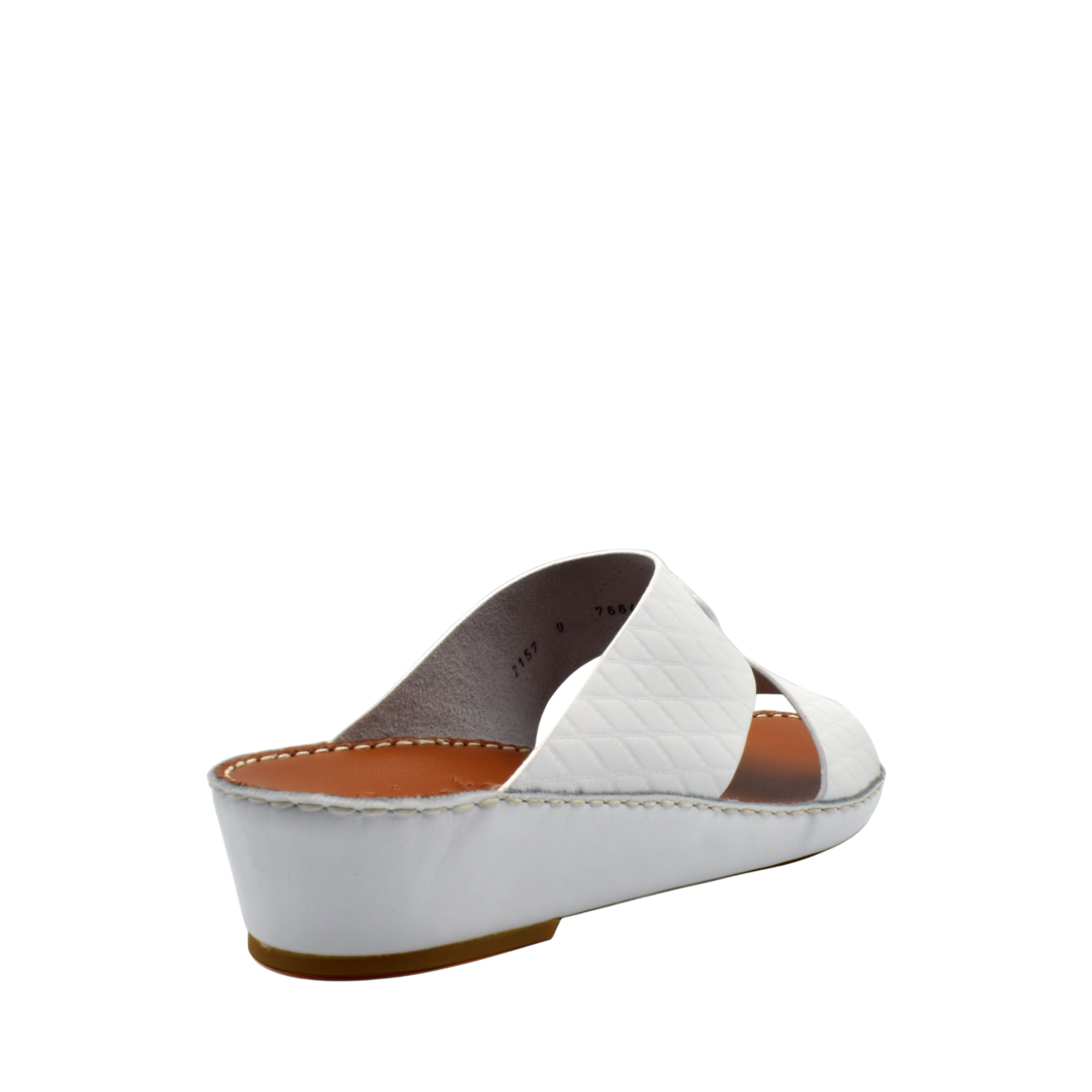White handcrafted Italian sandals with quilted straps and low wedge heel from Private Collection