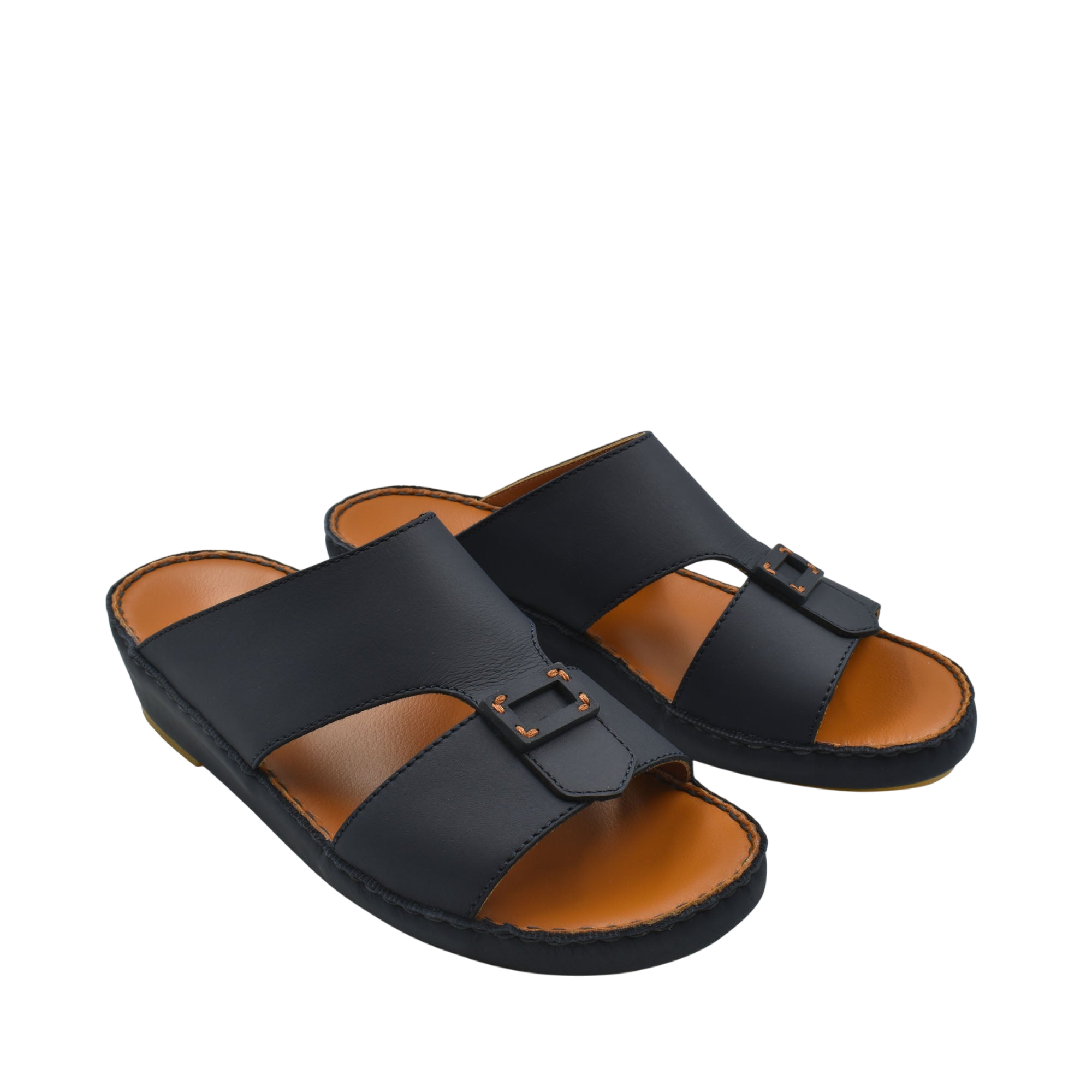 Black Italian leather sandals with buckle detail and cushioned tan footbed from private collection