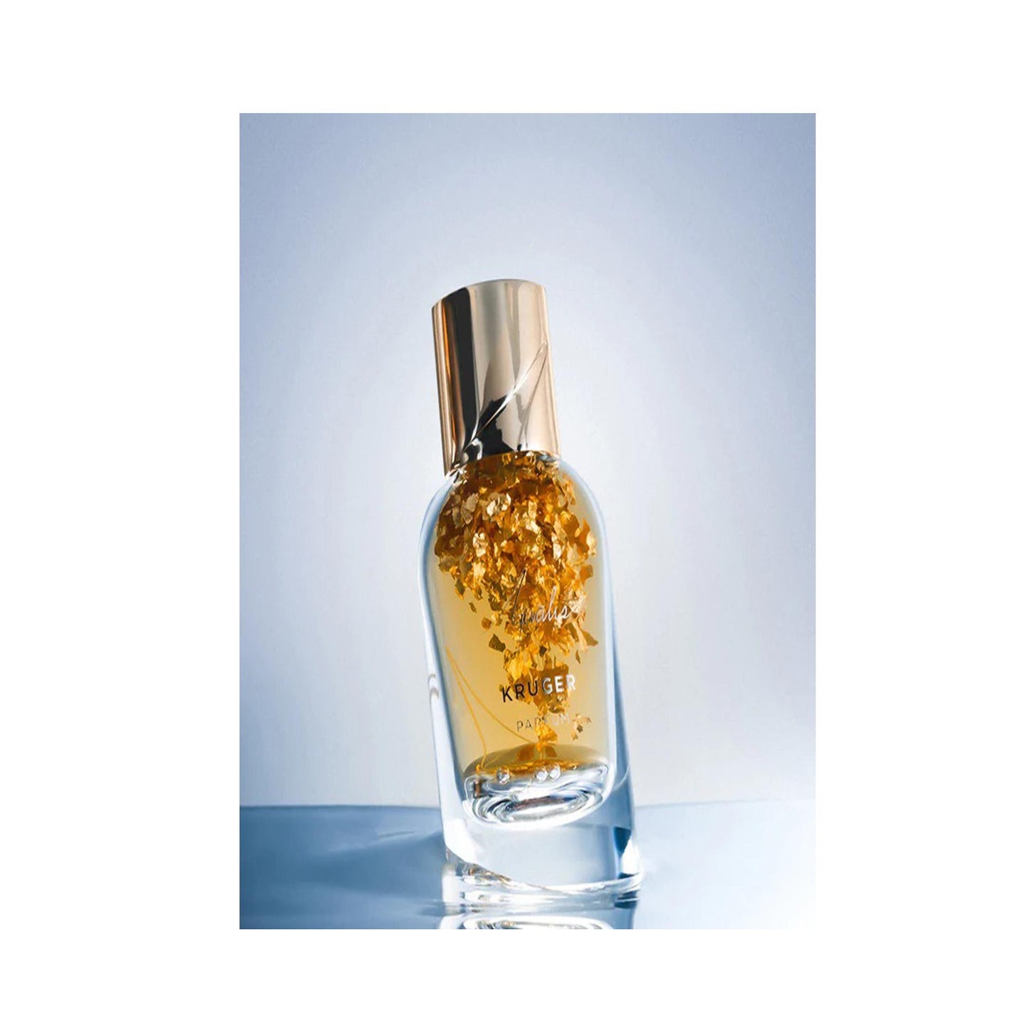 Luxury 50ml parfum bottle with gold flakes and a shiny gold cap from private collection