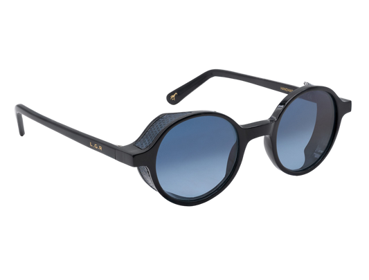 Black round sunglasses with blue tinted lenses from a luxury eyewear collection