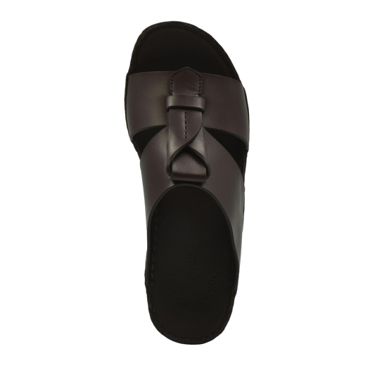 Top view of brown luxury leather sandals with a stylish knot design on the upper strap