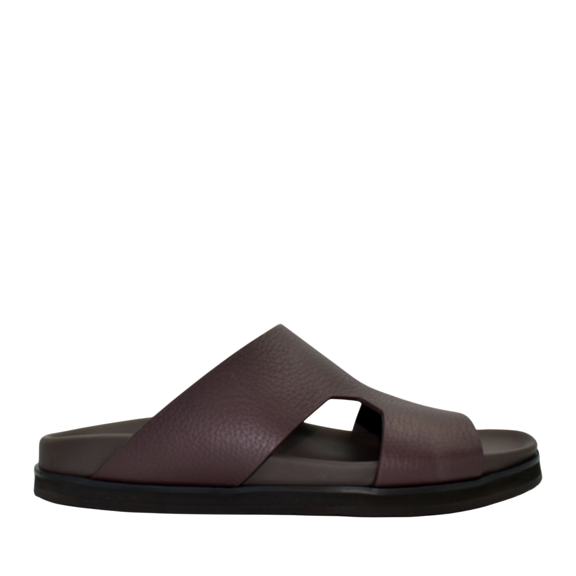 Side view of brown luxury leather sandals with wide straps and cushioned sole