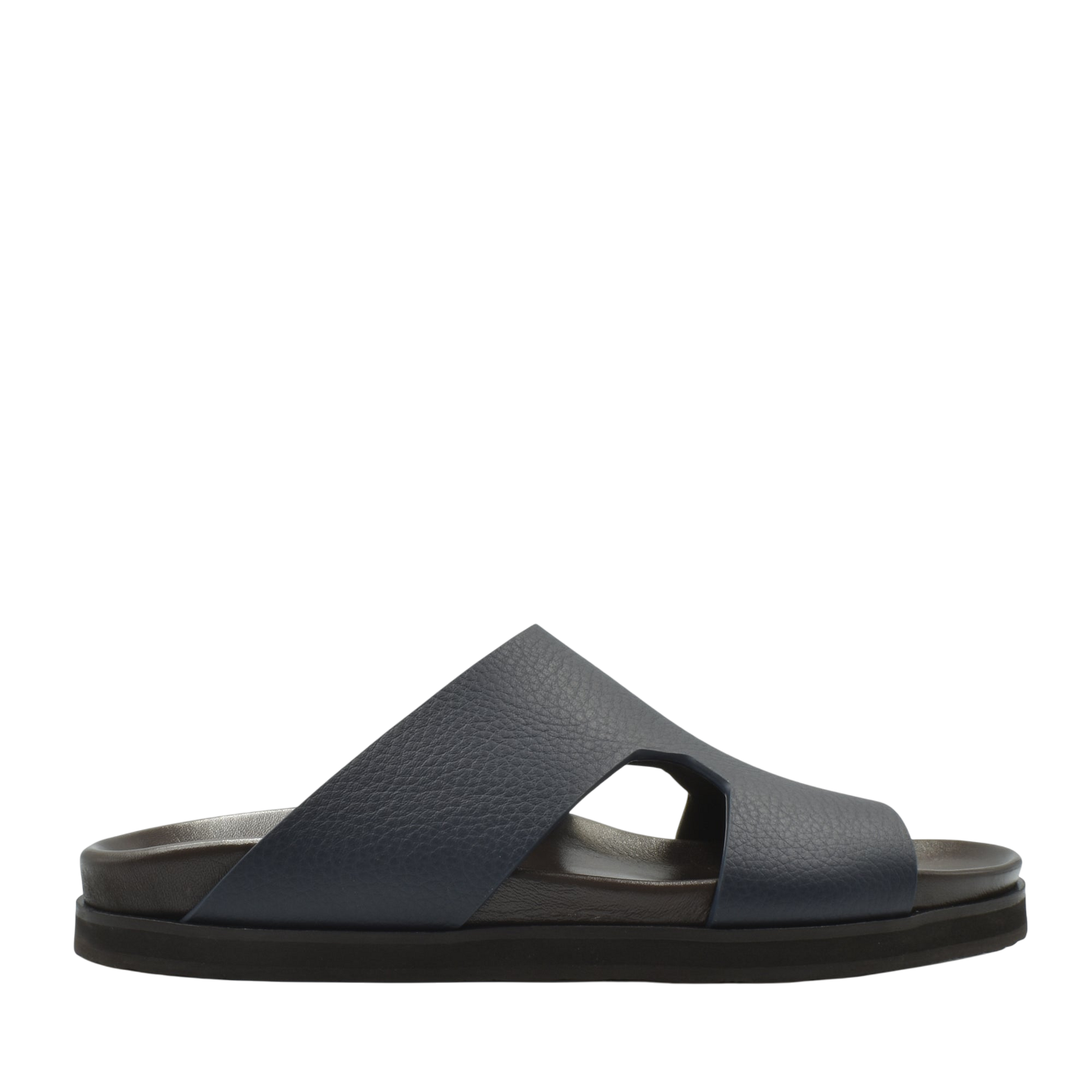 Side view of navy blue luxury leather sandals with wide cross straps and cushioned sole