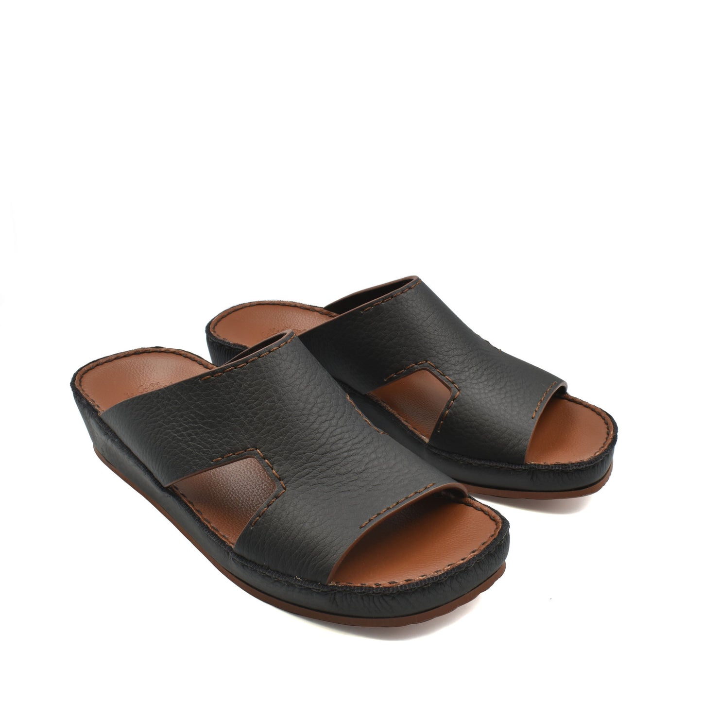 Black luxury leather slide sandals with open toe and cushioned brown footbed