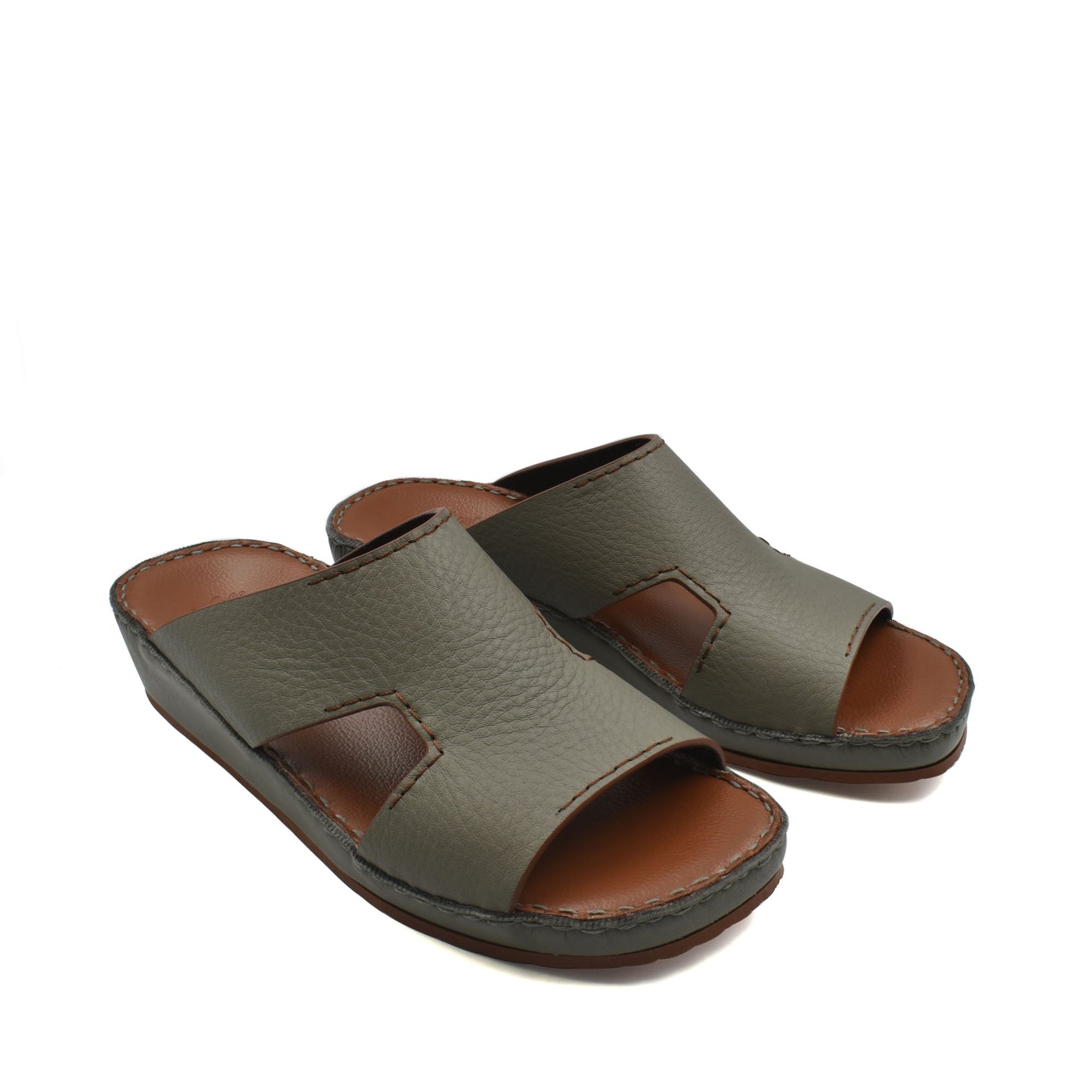 Pair of olive green luxury leather slide sandals with open toe and cushioned footbed