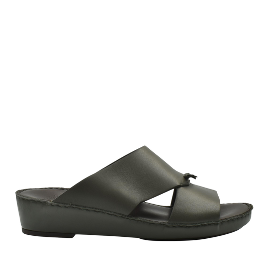 Side view of luxury nappa leather sandal in dark olive with cross strap design and comfortable sole