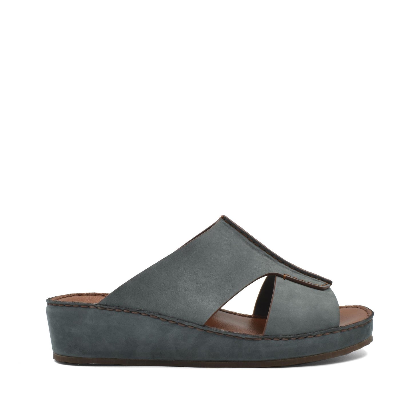 Side view of gray luxury nubuck slides with cutout design and cushioned sole from Private collection