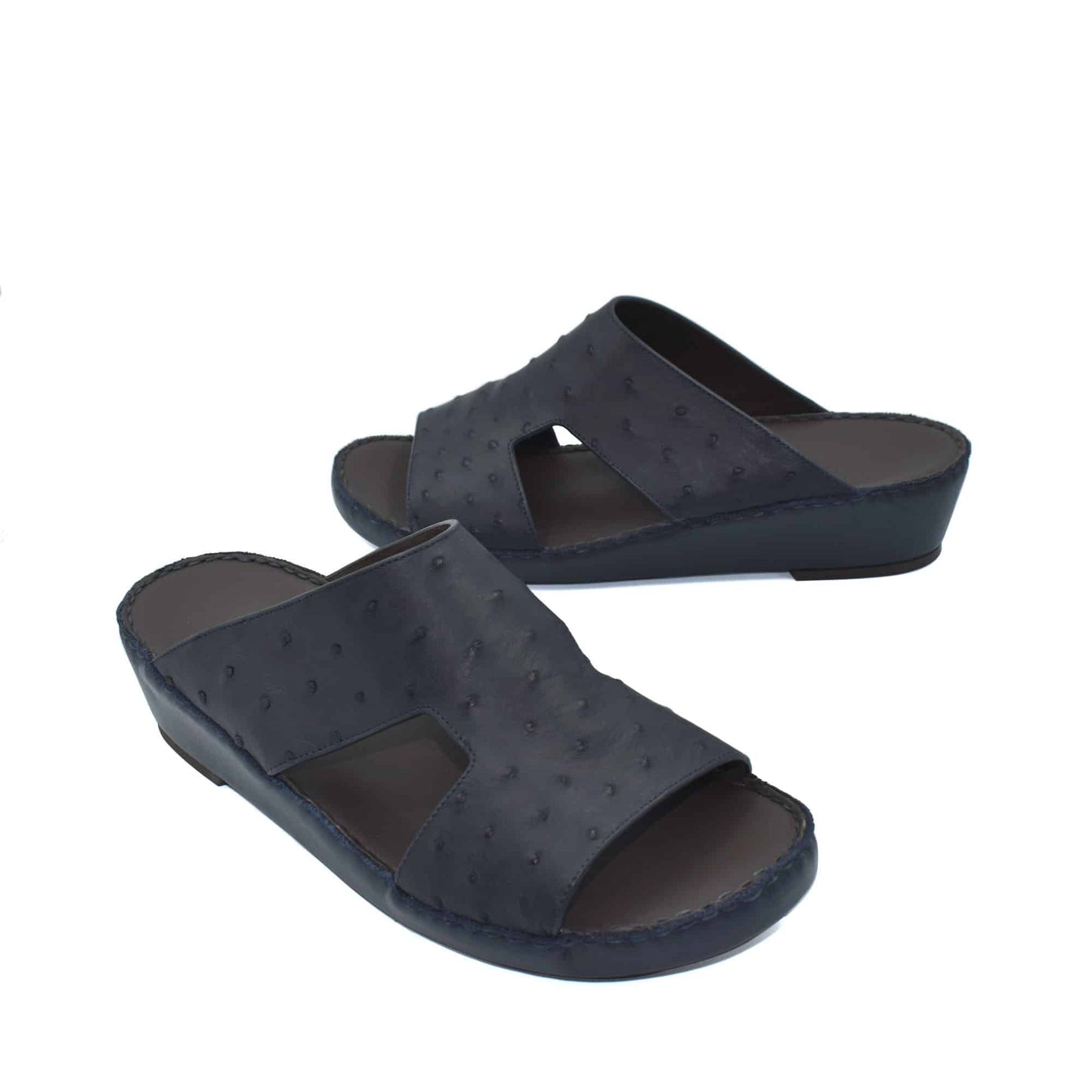 Black luxury ostrich sandals with open toe and textured leather upper from private collection