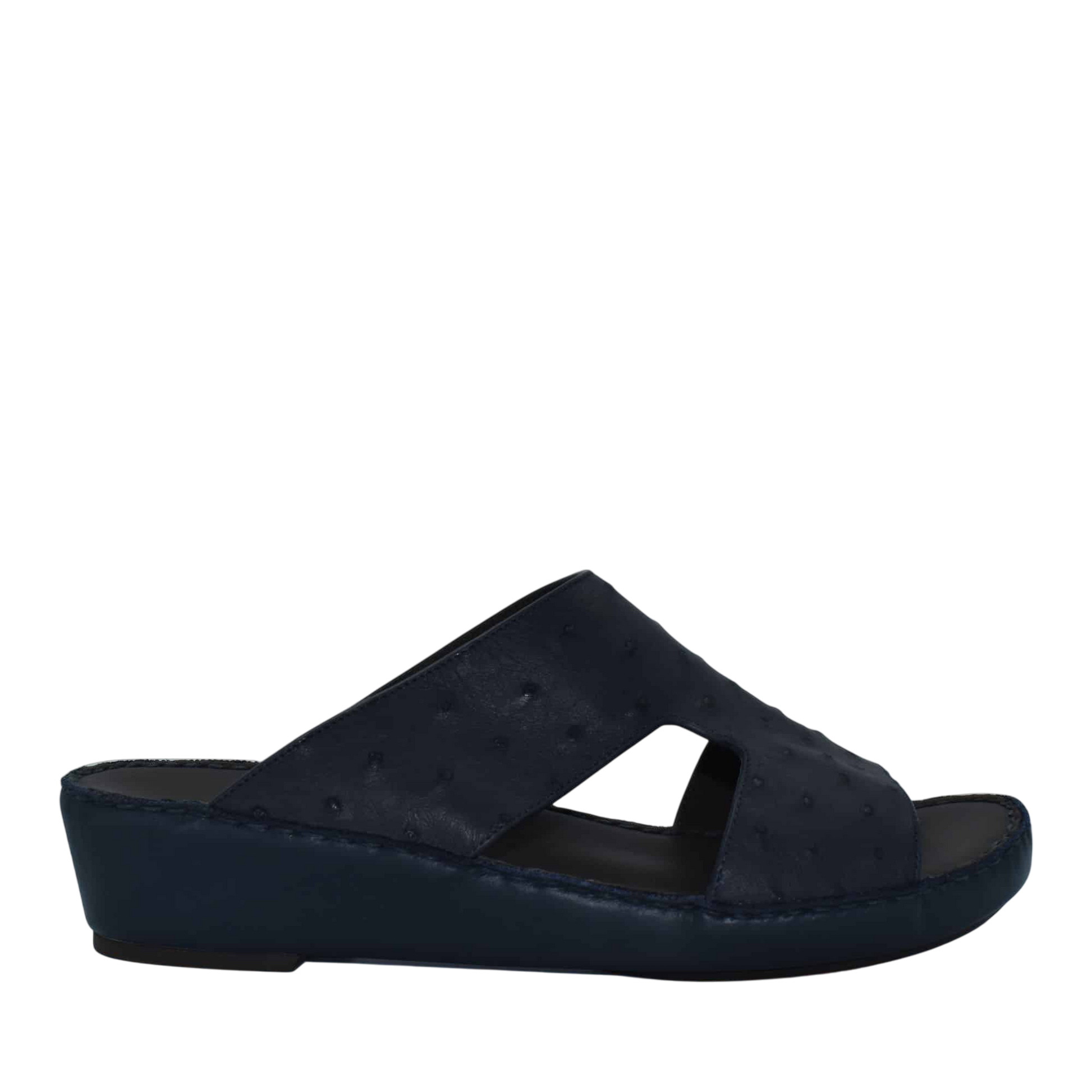 Black luxury ostrich sandals with wedge heel and open toe design from Private Collection