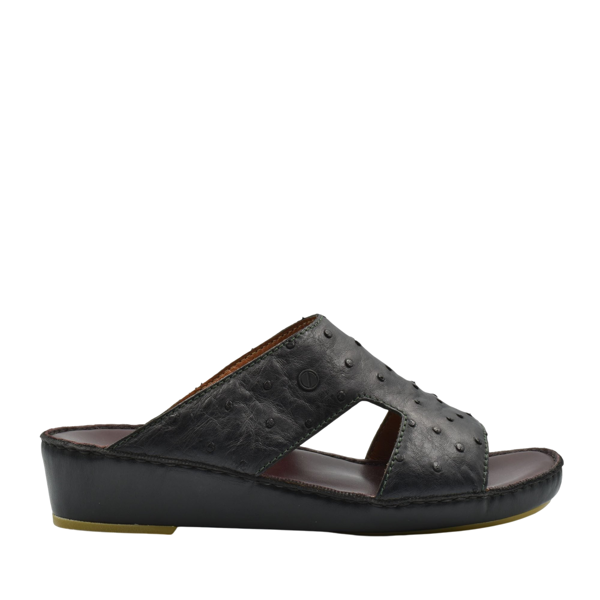 Black luxury ostrich sandals with textured leather upper and wedge sole from Private Collection