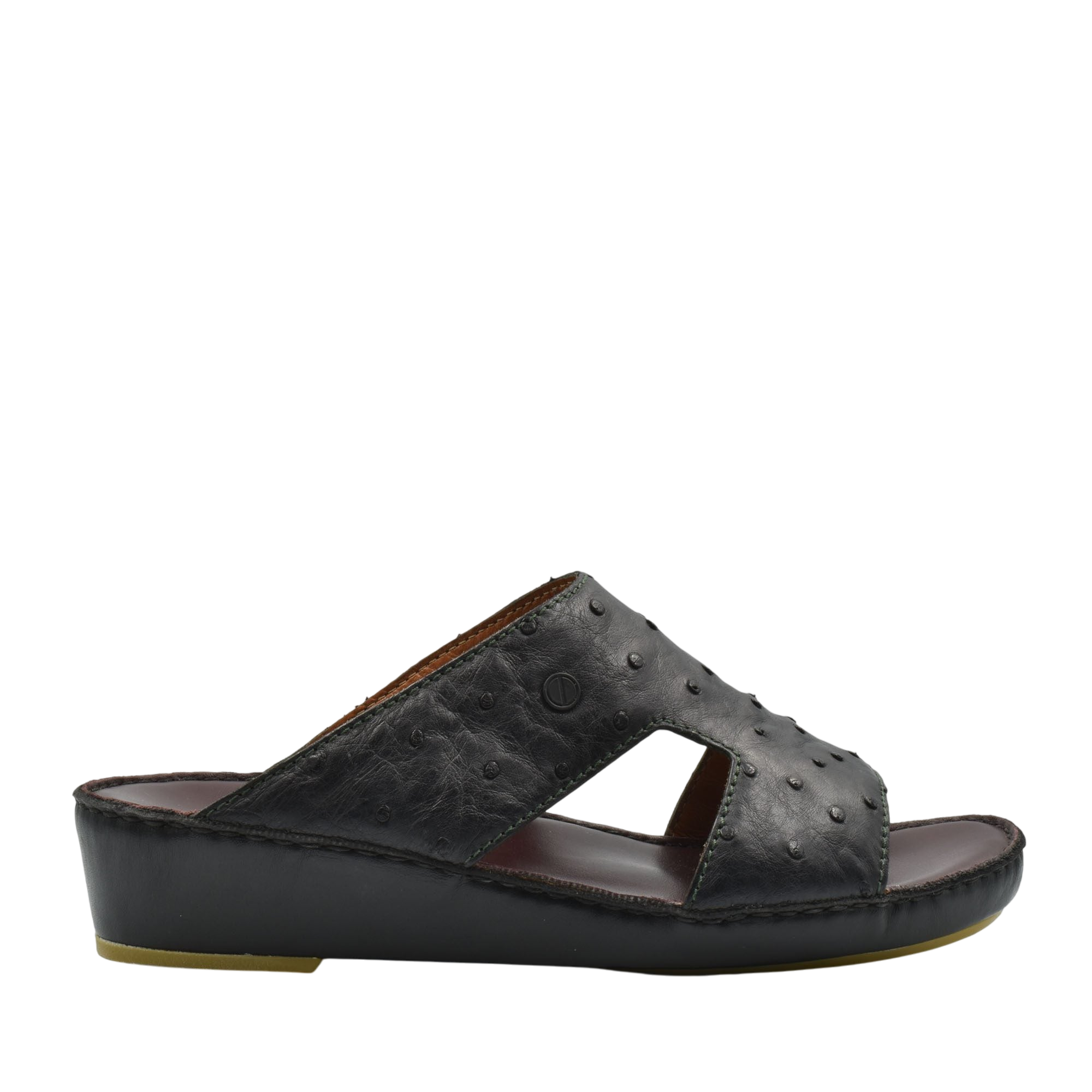 Black luxury ostrich sandals with textured leather upper and wedge sole from Private Collection