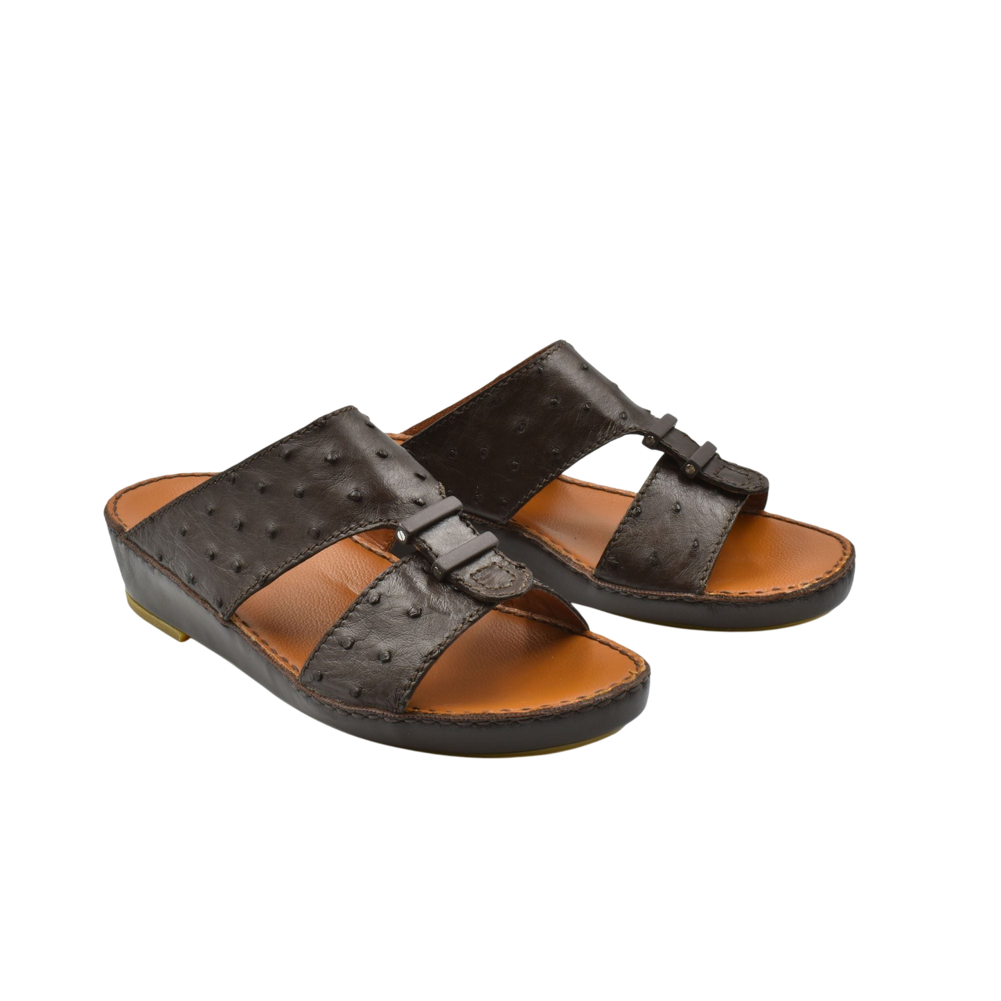 Pair of brown luxury ostrich sandals with textured leather straps and cushioned tan footbed
