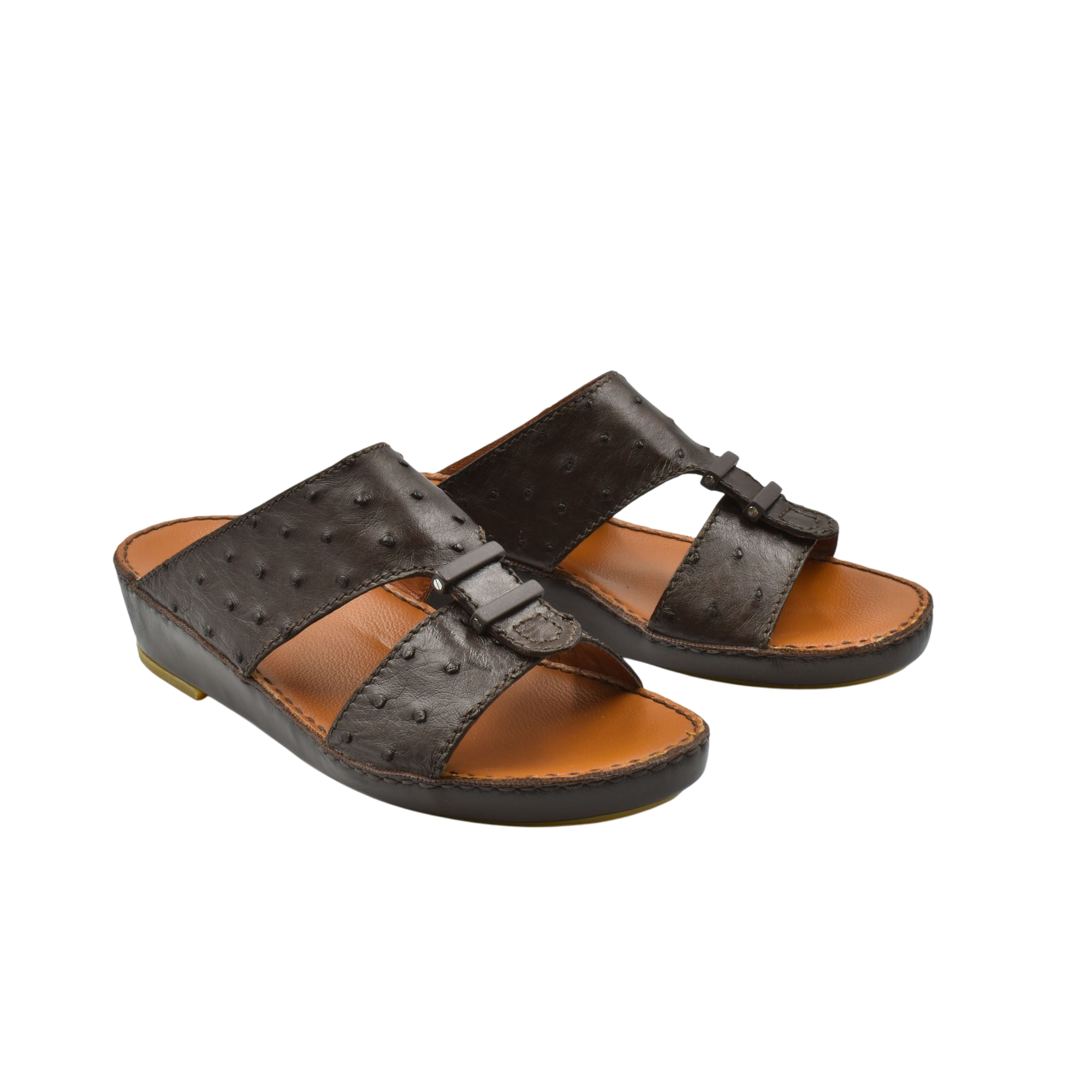 Pair of brown luxury ostrich sandals with textured leather straps and cushioned tan footbed