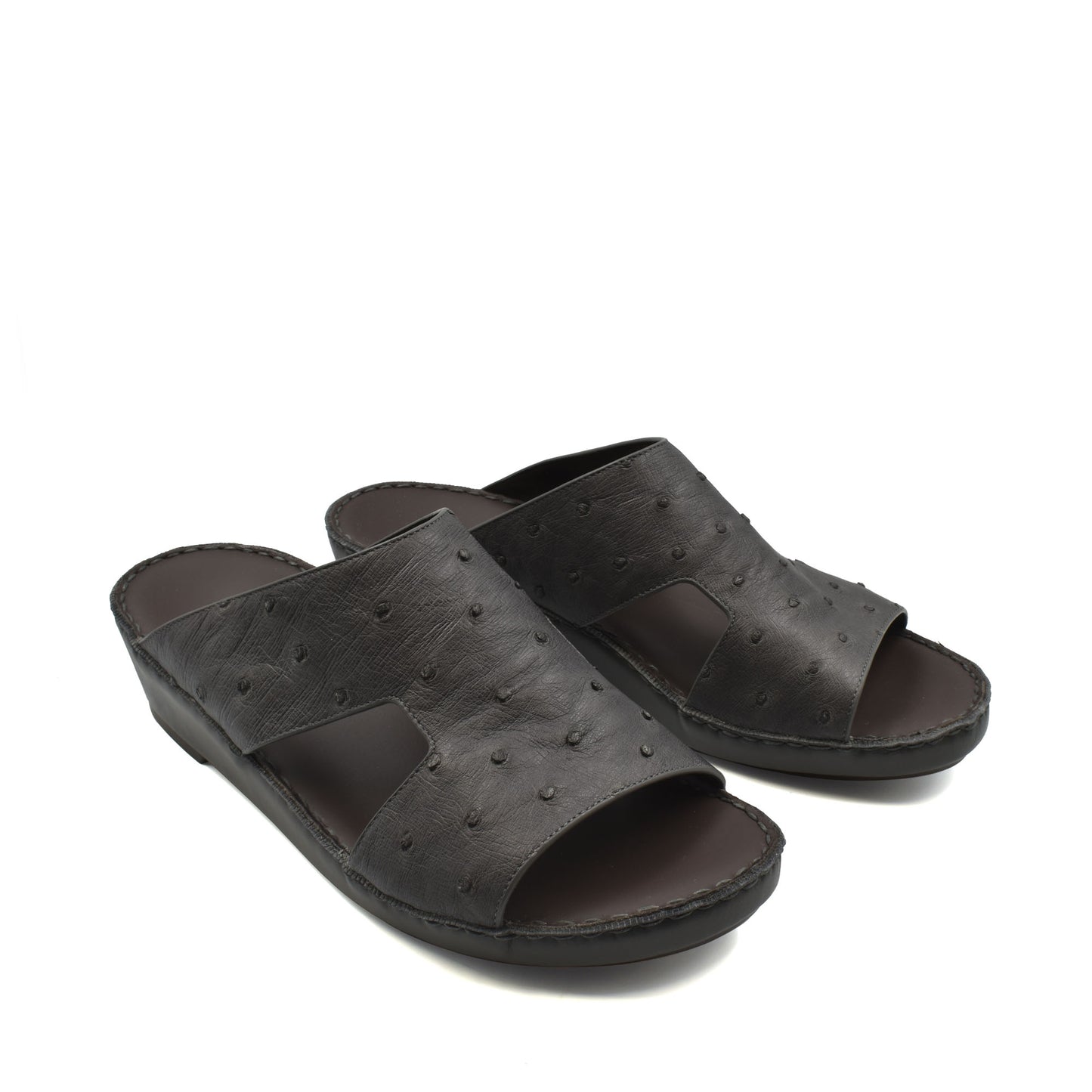 Black luxury ostrich sandals with open toe and textured leather design from private collection