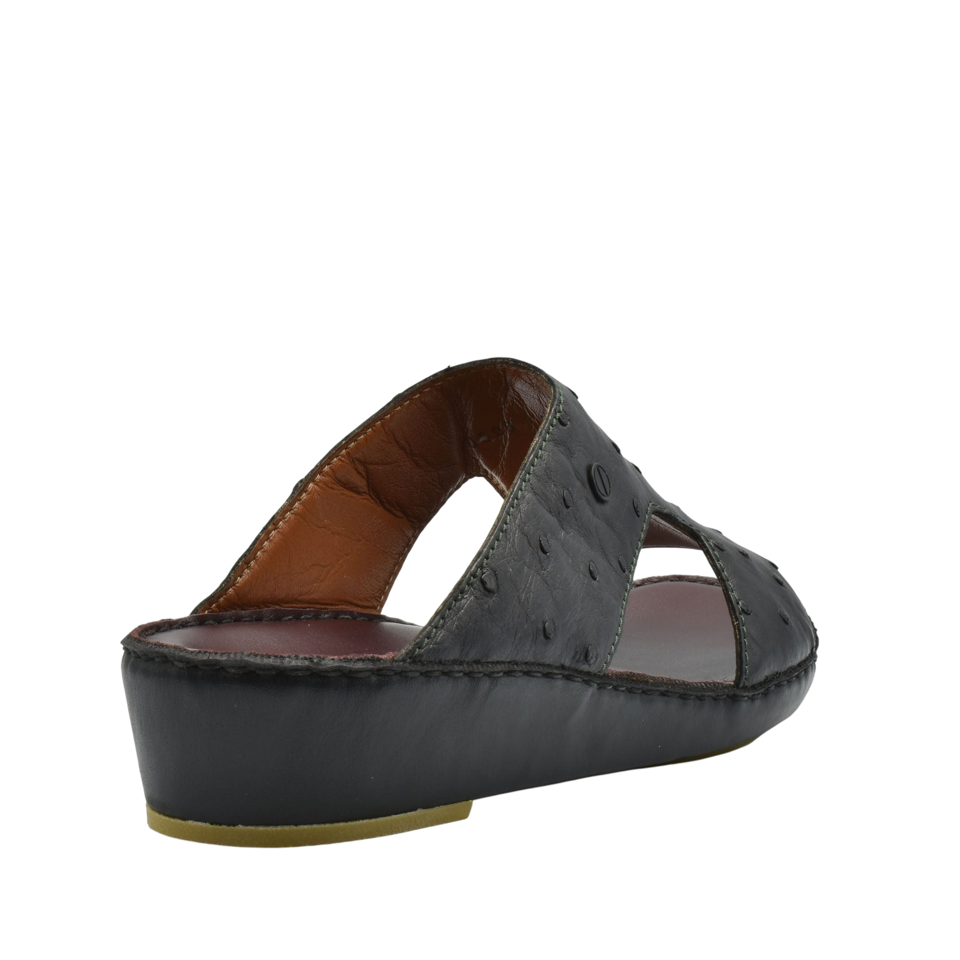 Black luxury ostrich sandals with open design and cushioned sole from Private Collection