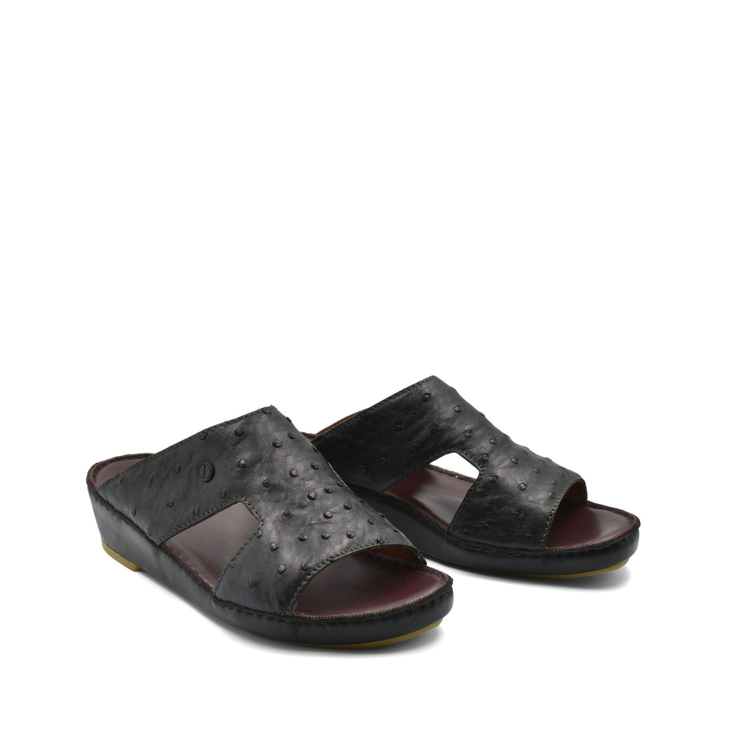 Black luxury ostrich sandals with open toe and textured leather design from Private collection