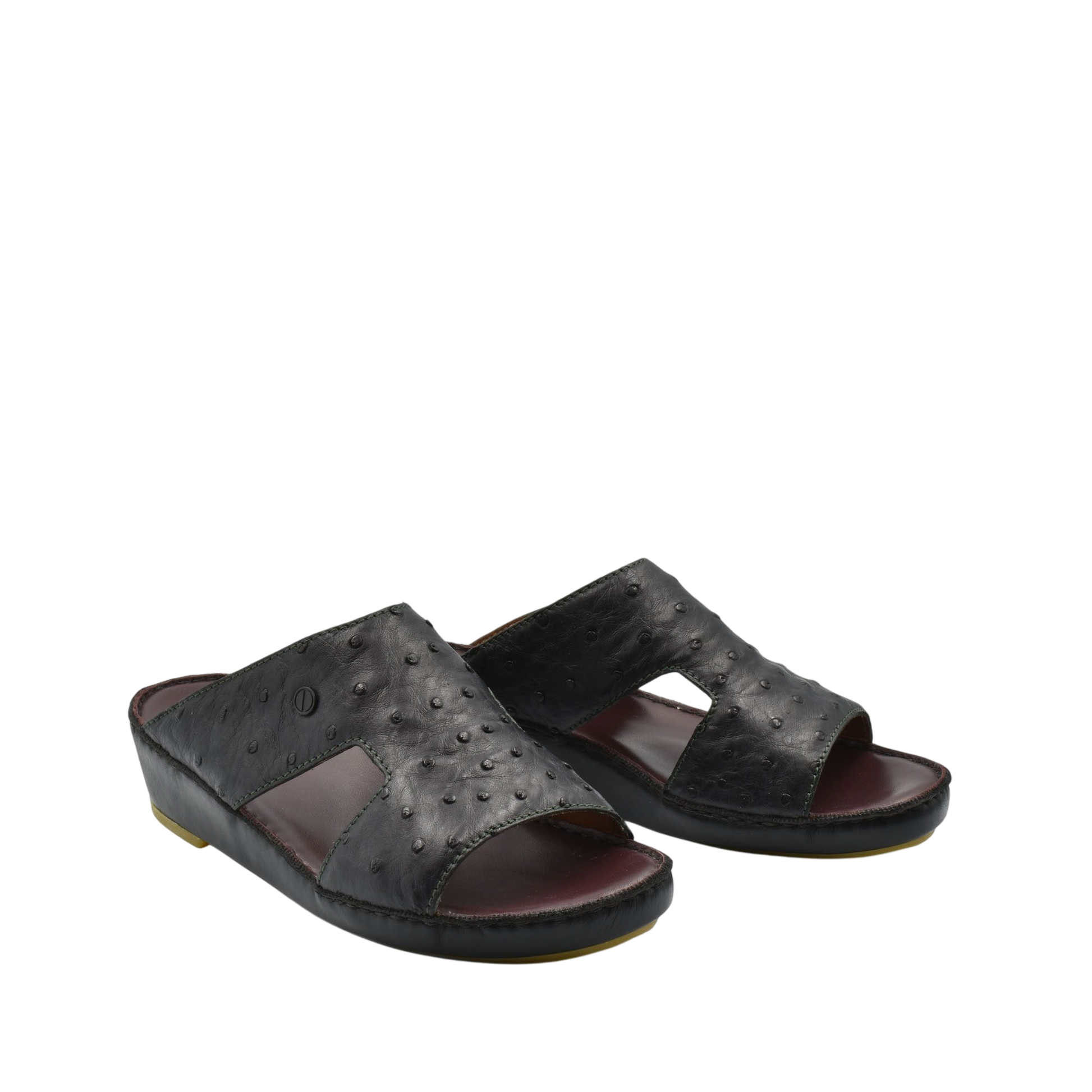Black luxury ostrich sandals with open toe and textured leather design from Private collection