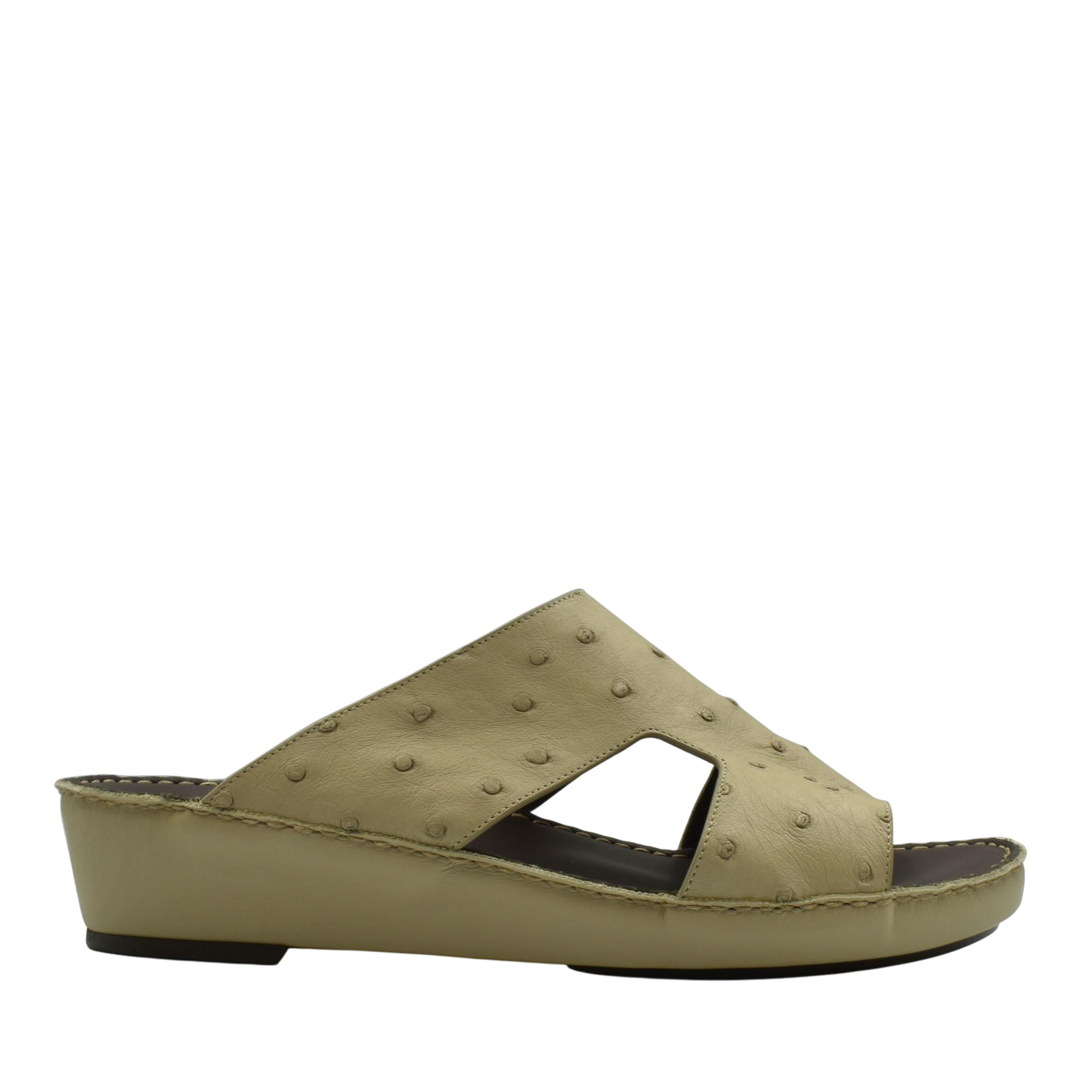 Beige luxury ostrich sandals with textured leather upper and wedge sole from private collection