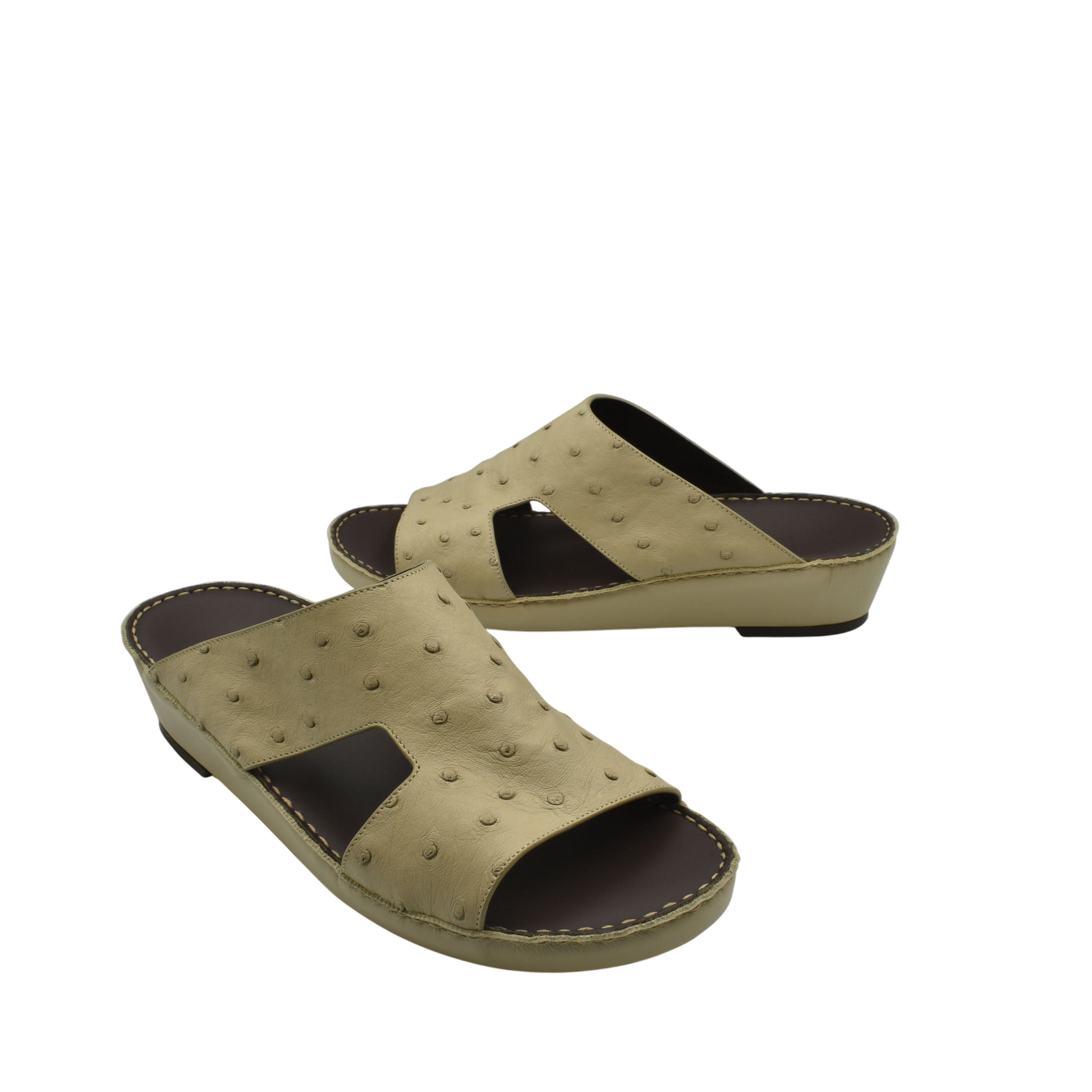 Beige luxury ostrich sandals with open toe and cutout design on leather sole
