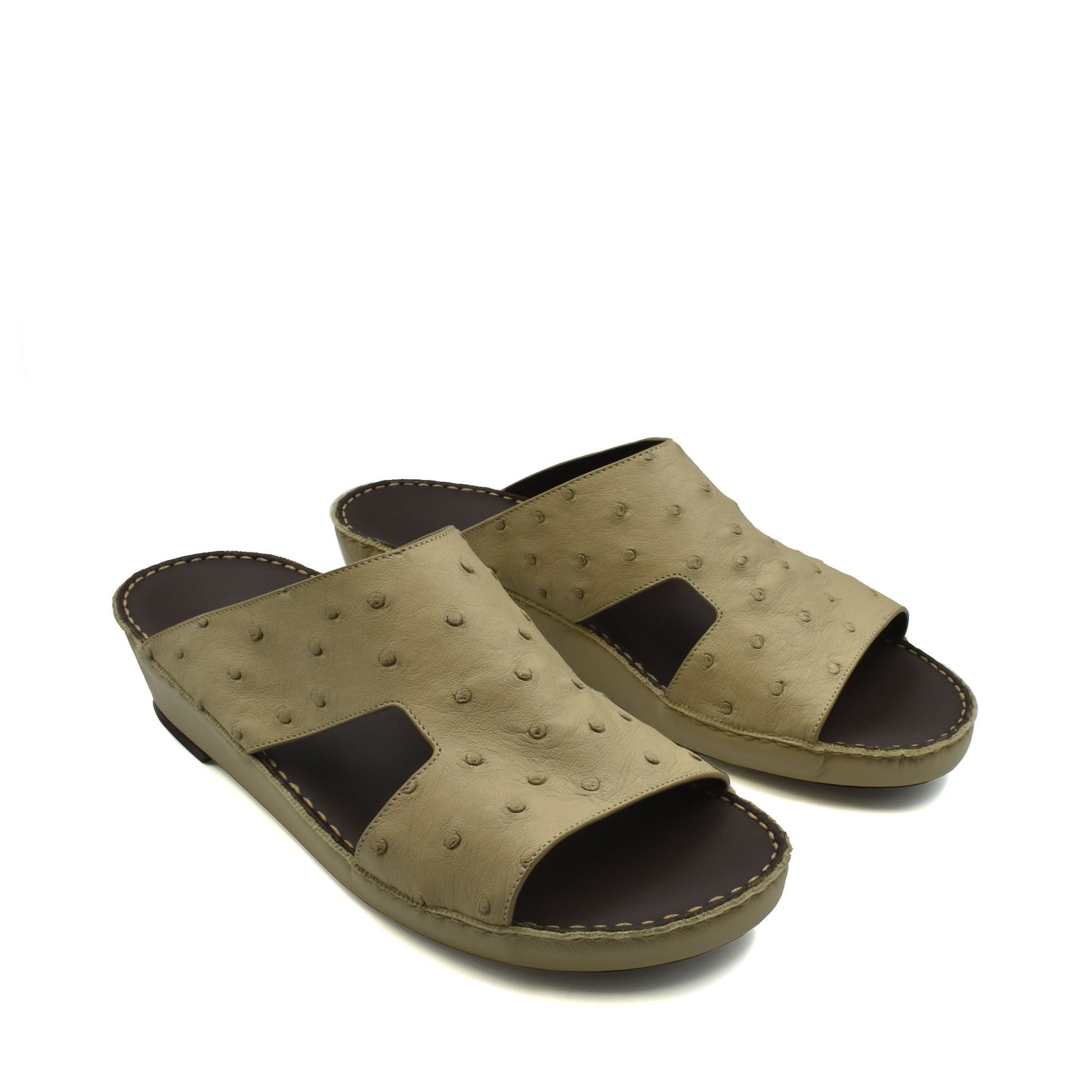 Tan luxury ostrich sandals with open toe and textured leather upper from Private Collection