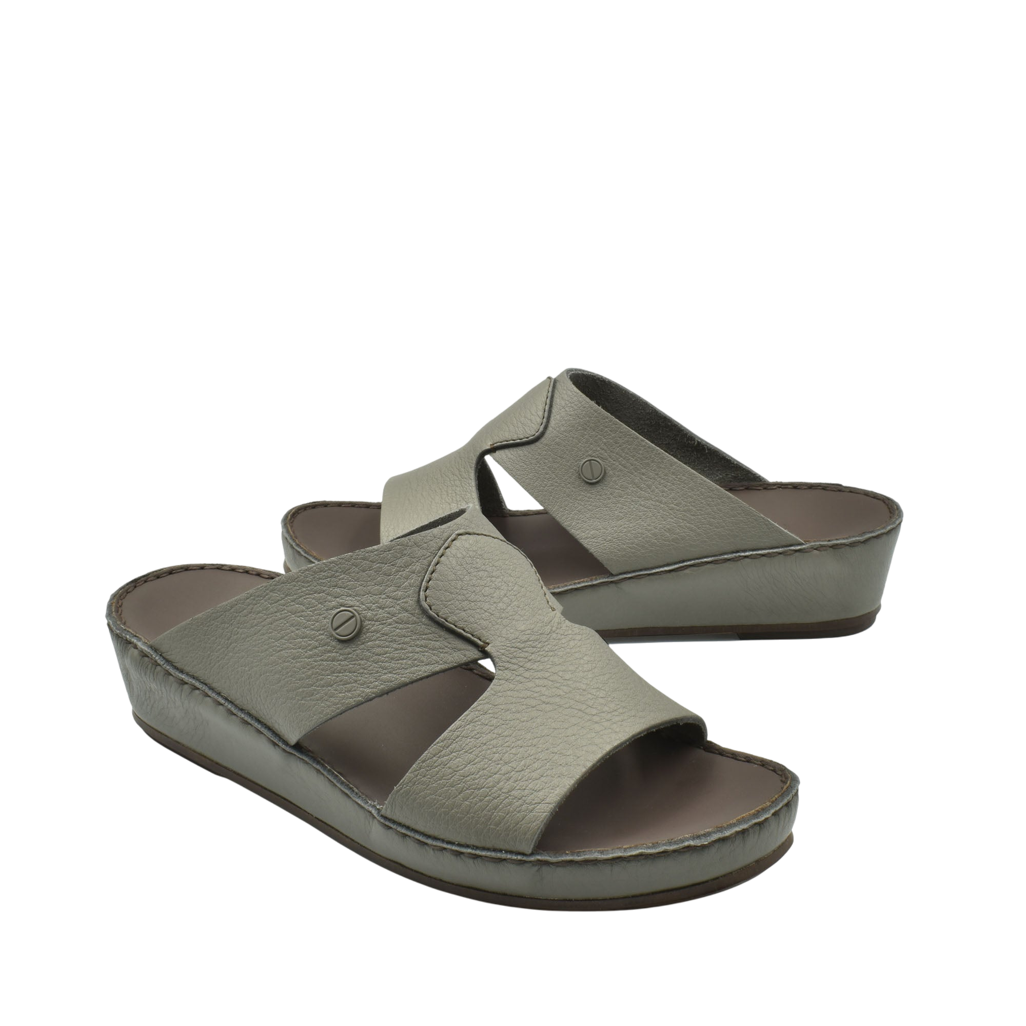 Private collection luxury slip-on footwear in taupe with cushioned sole and open toe design