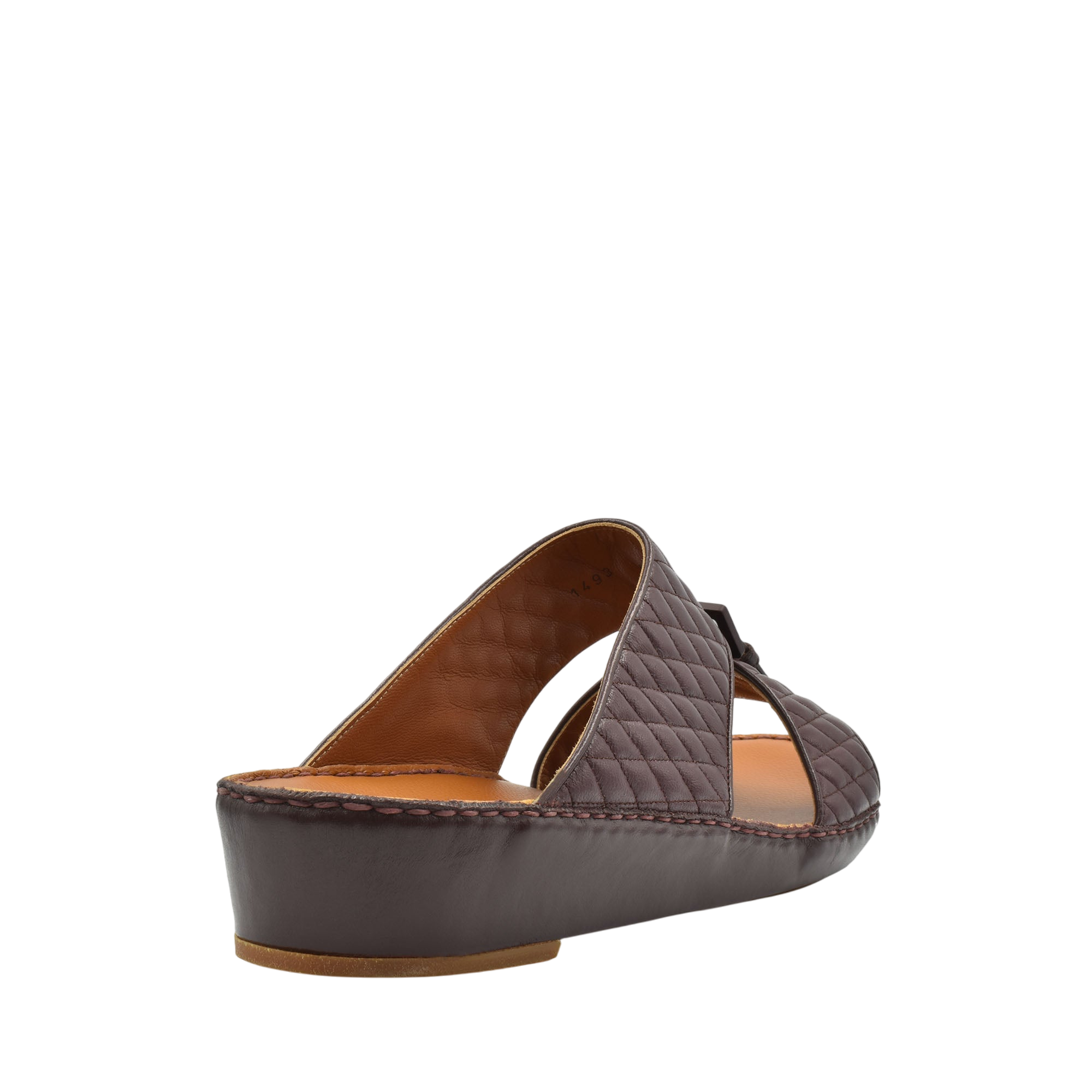 Brown quilted luxury slip-on footwear with low wedge heel and cushioned insole from Private collection