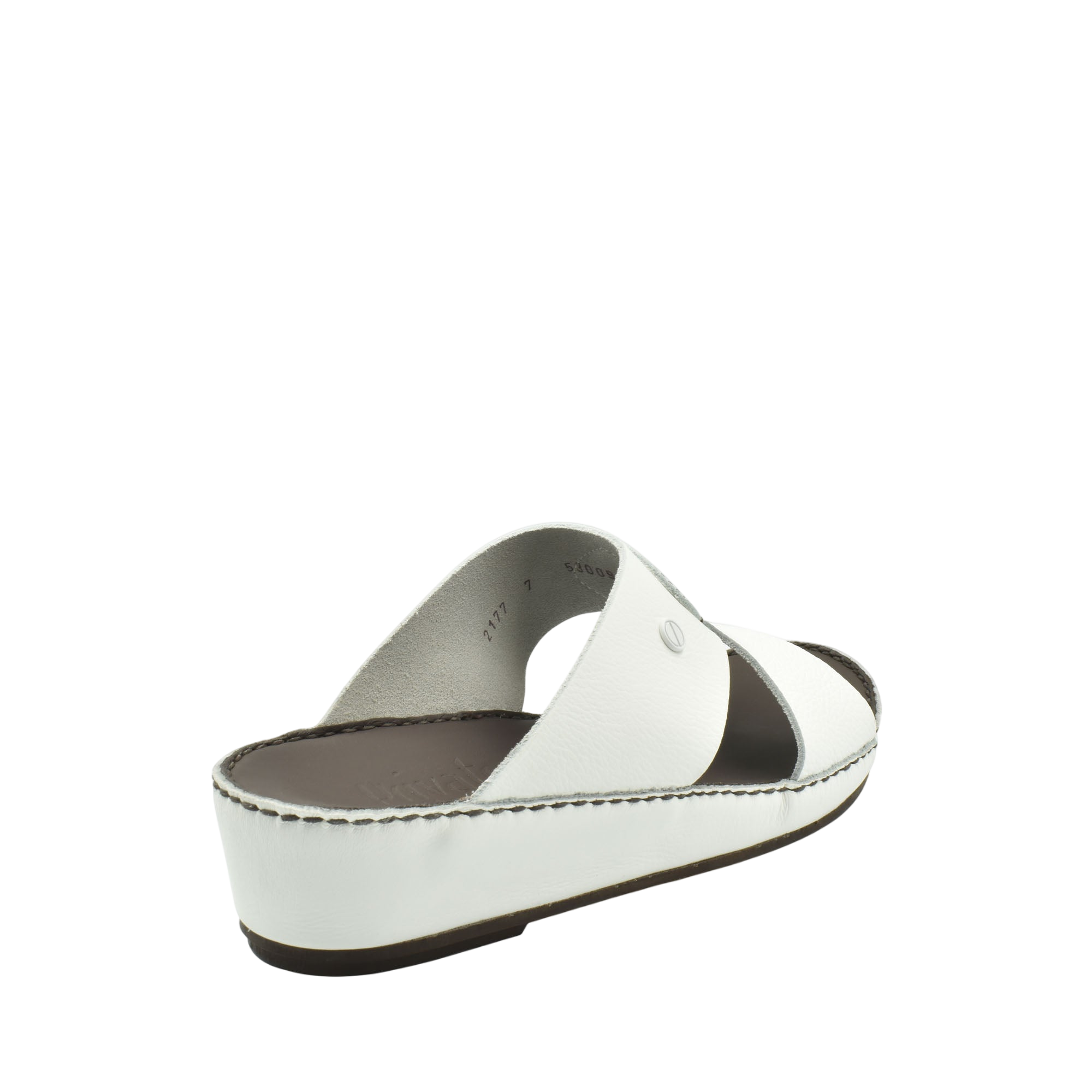 White luxury slip-on footwear with cushioned sole and open-toe design from Private Collection