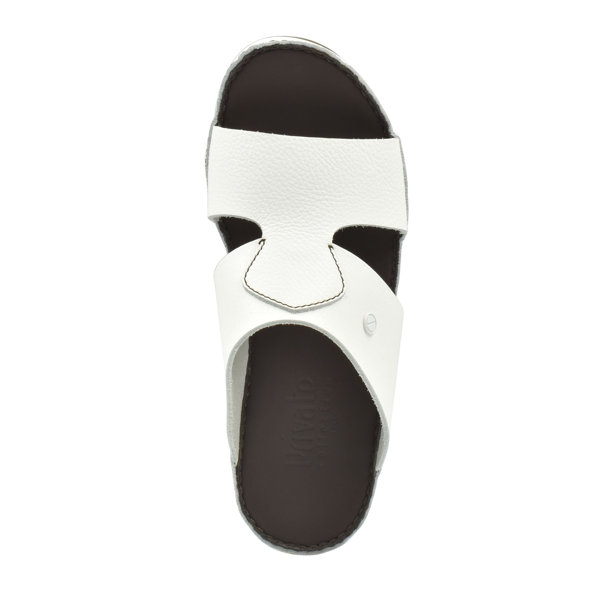 White luxury slip-on footwear with textured upper and dark cushioned footbed from Private Collection