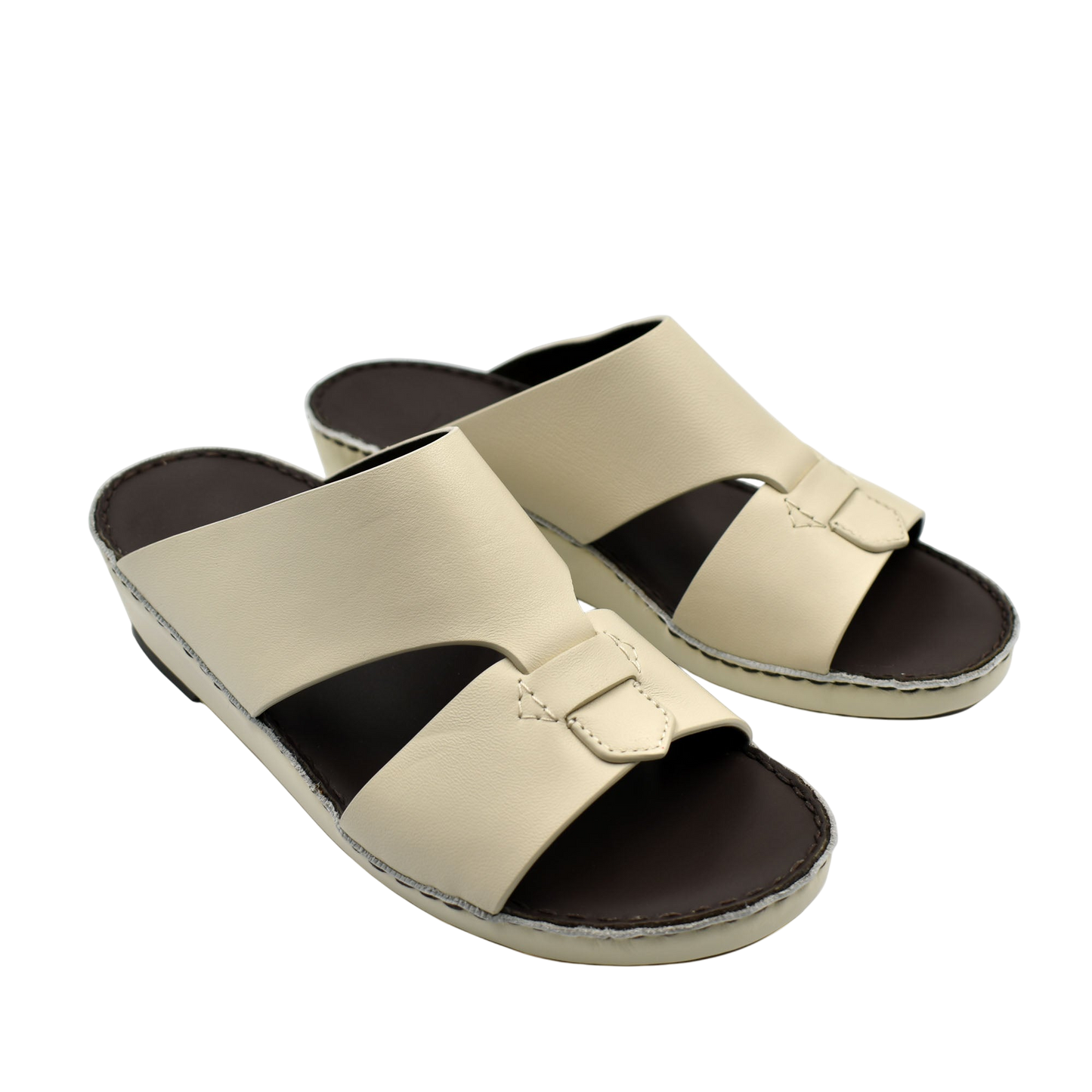 Beige Nappa leather sandals with cushioned black footbed and slip-on design for comfort
