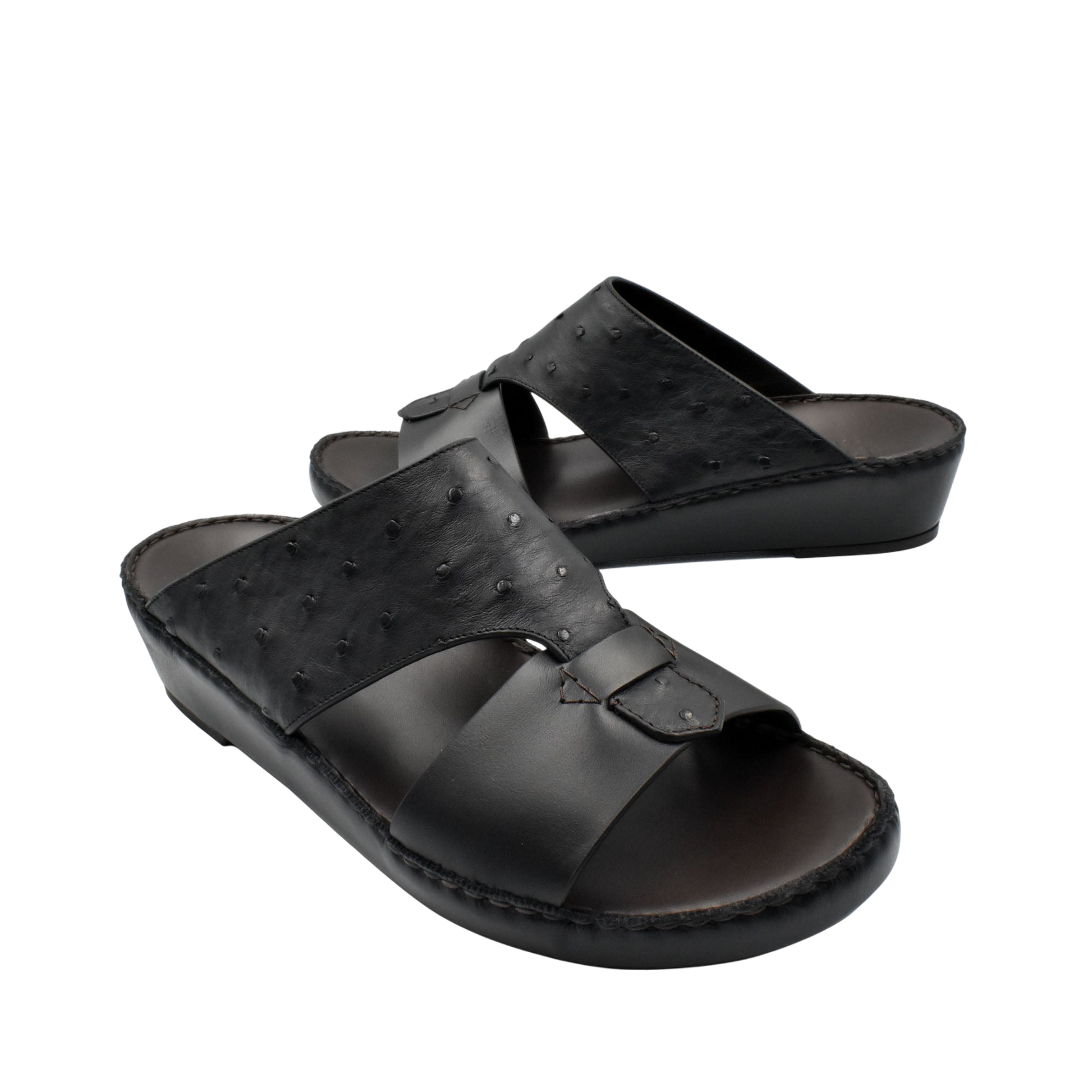 Black ostrich embossed slip on sandals with open toe and cushioned sole