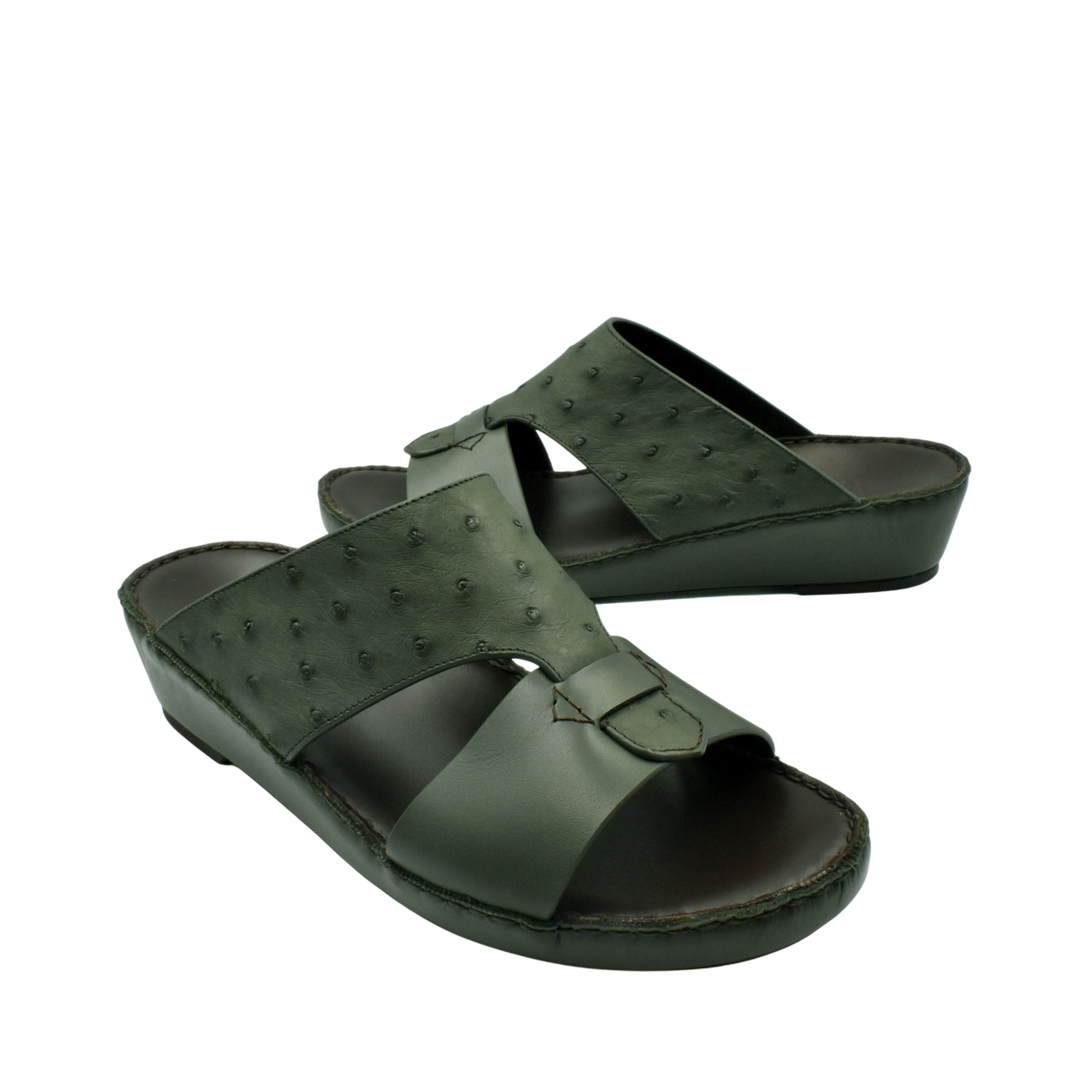 Dark green ostrich embossed slip on sandals with cushioned sole for comfortable wear