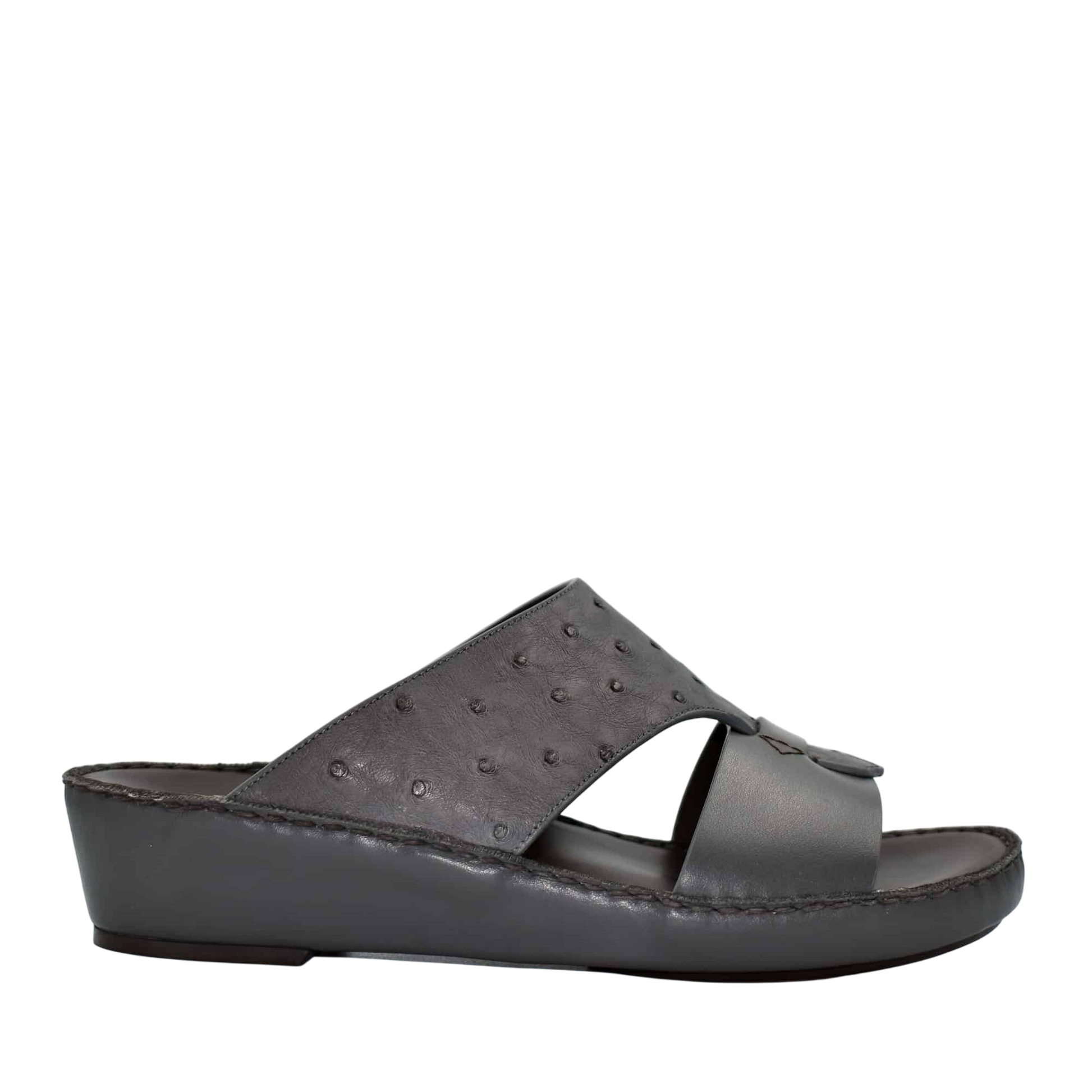 Black ostrich embossed slip on sandals with cushioned wedge sole from Private collection