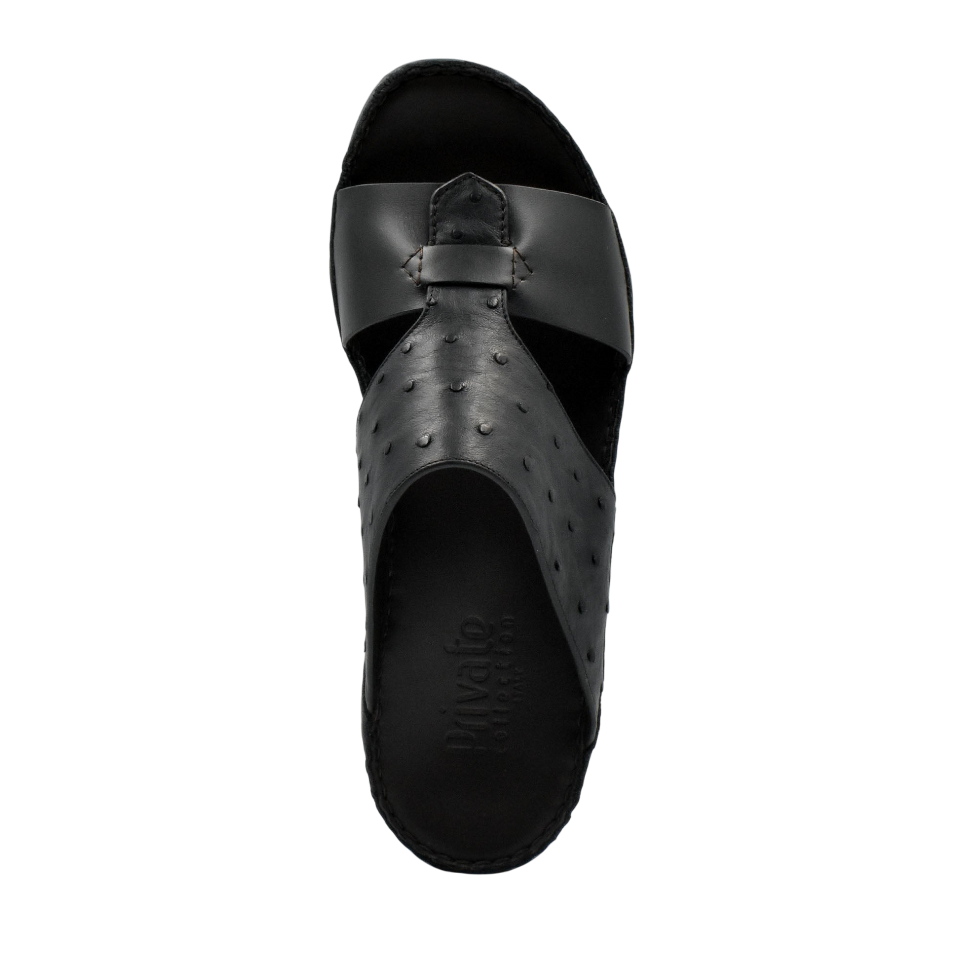 Black ostrich embossed slip on sandals with textured upper and open toe design from Private Collection
