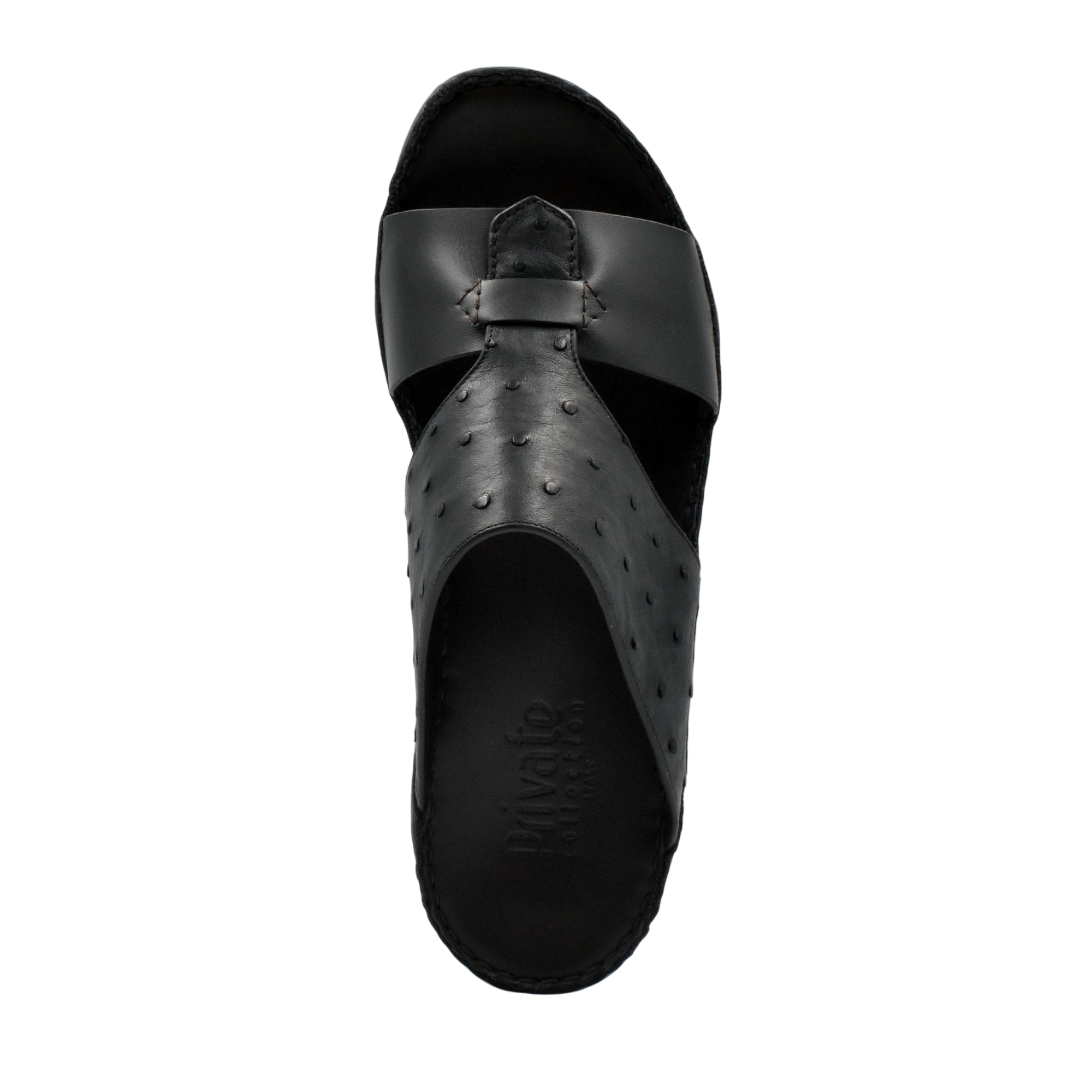 Black ostrich embossed slip on sandals with textured upper and open toe design from Private Collection