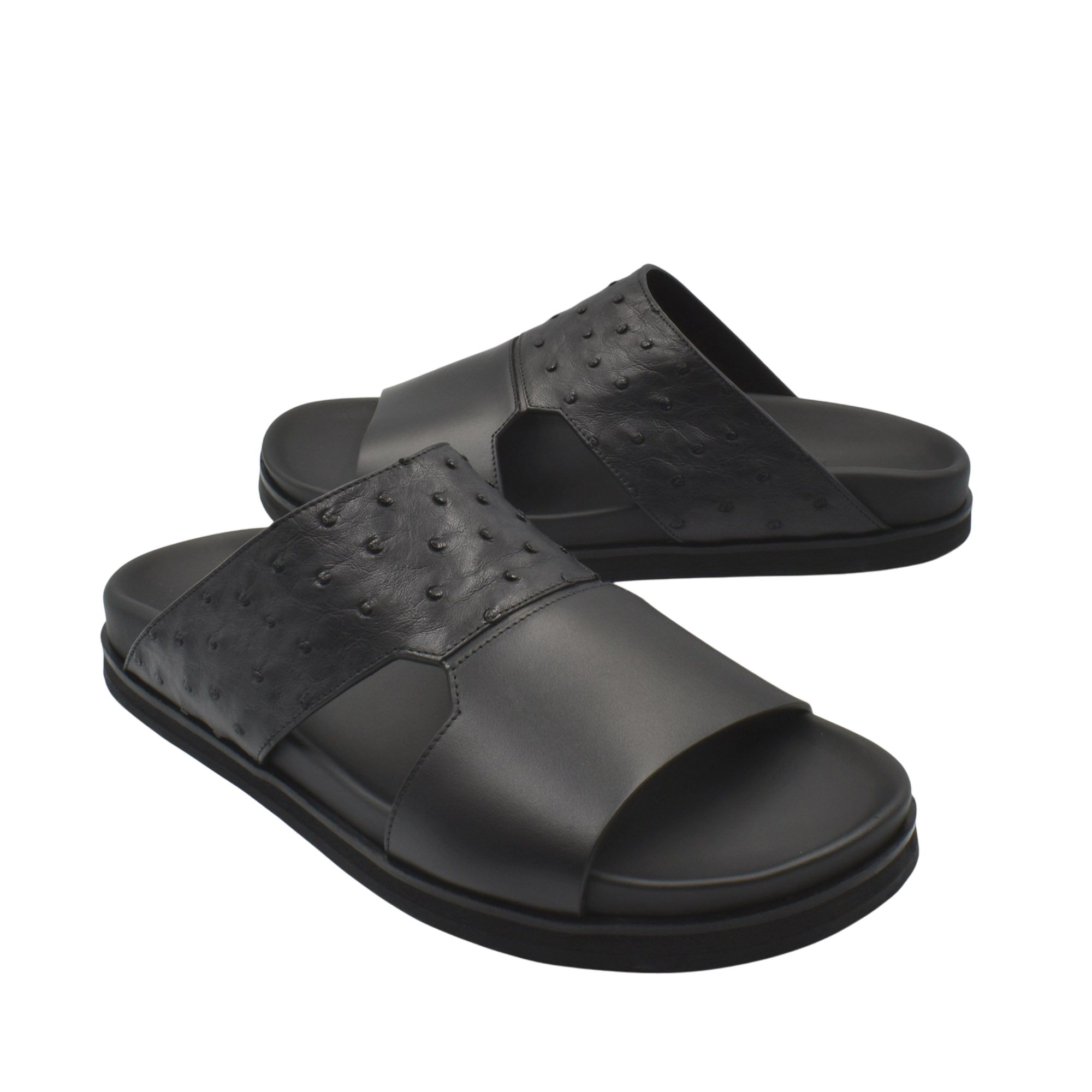 Black ostrich leather footwear slide sandals with textured upper and cushioned sole